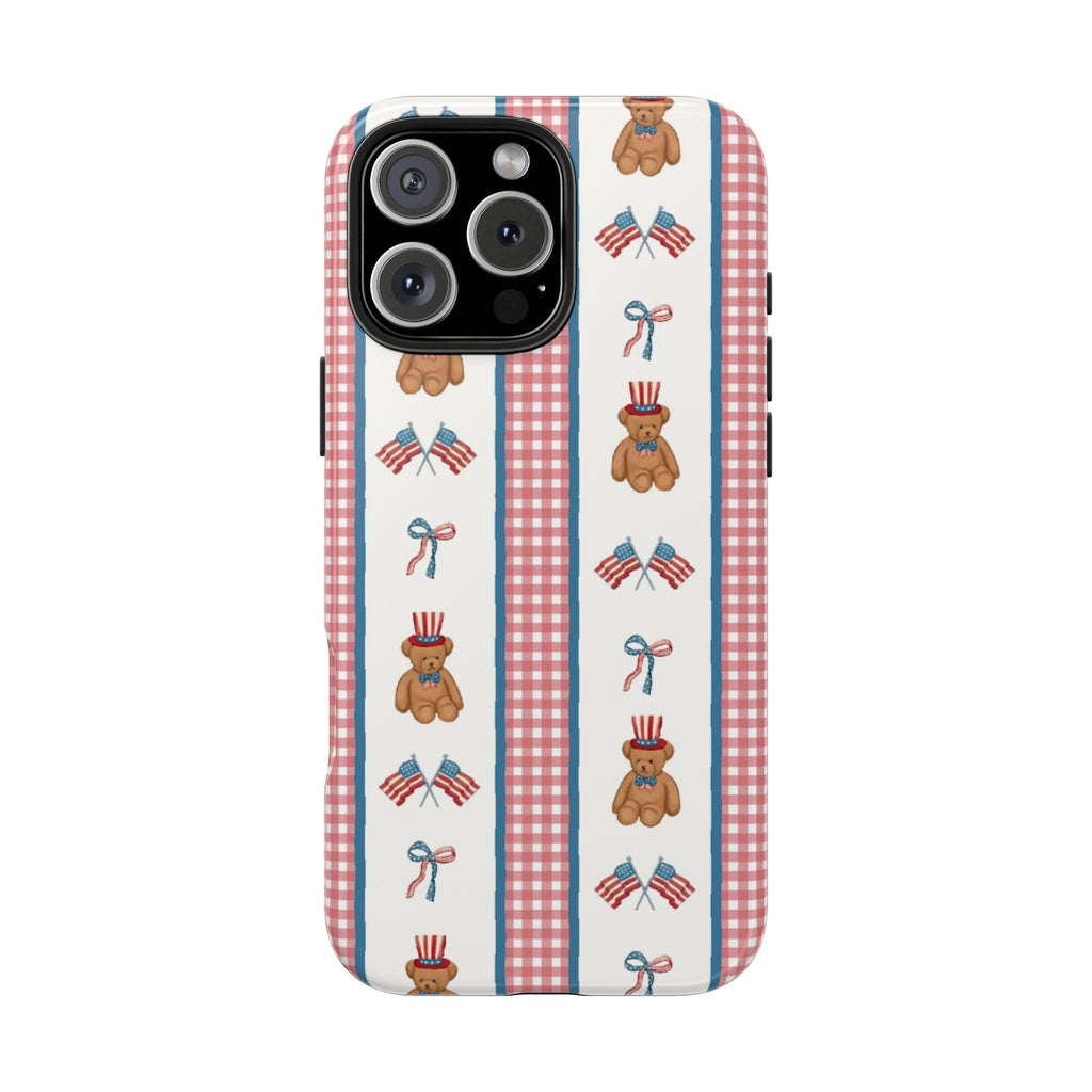 Phone case with repeating patriotic teddy bears, flags, and bow ribbons on blue