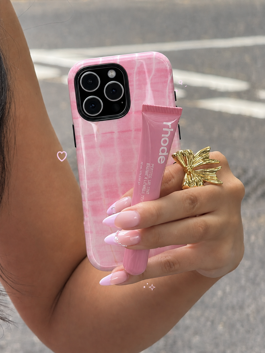 Pink shibori tie-dye phone case with camera cutouts, translucent TPU cover
