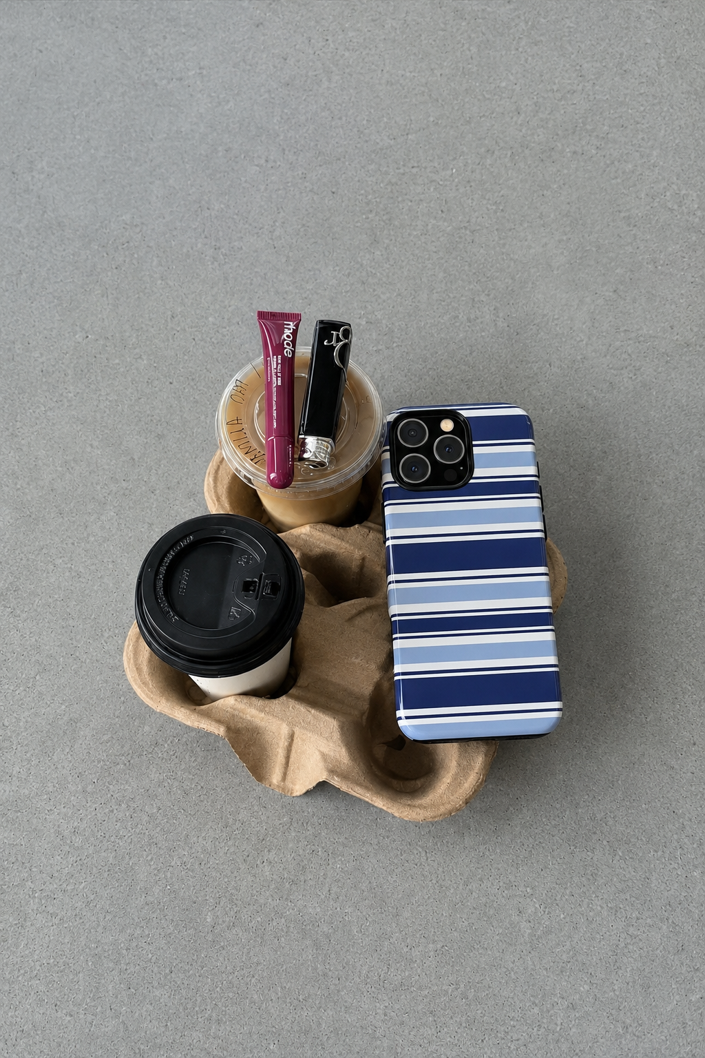 Blue and white striped phone case with raised camera cutouts