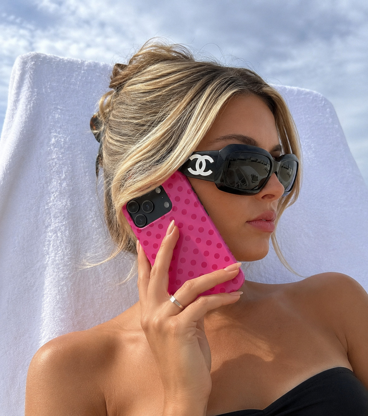 Pink polka dot phone case with camera cutouts