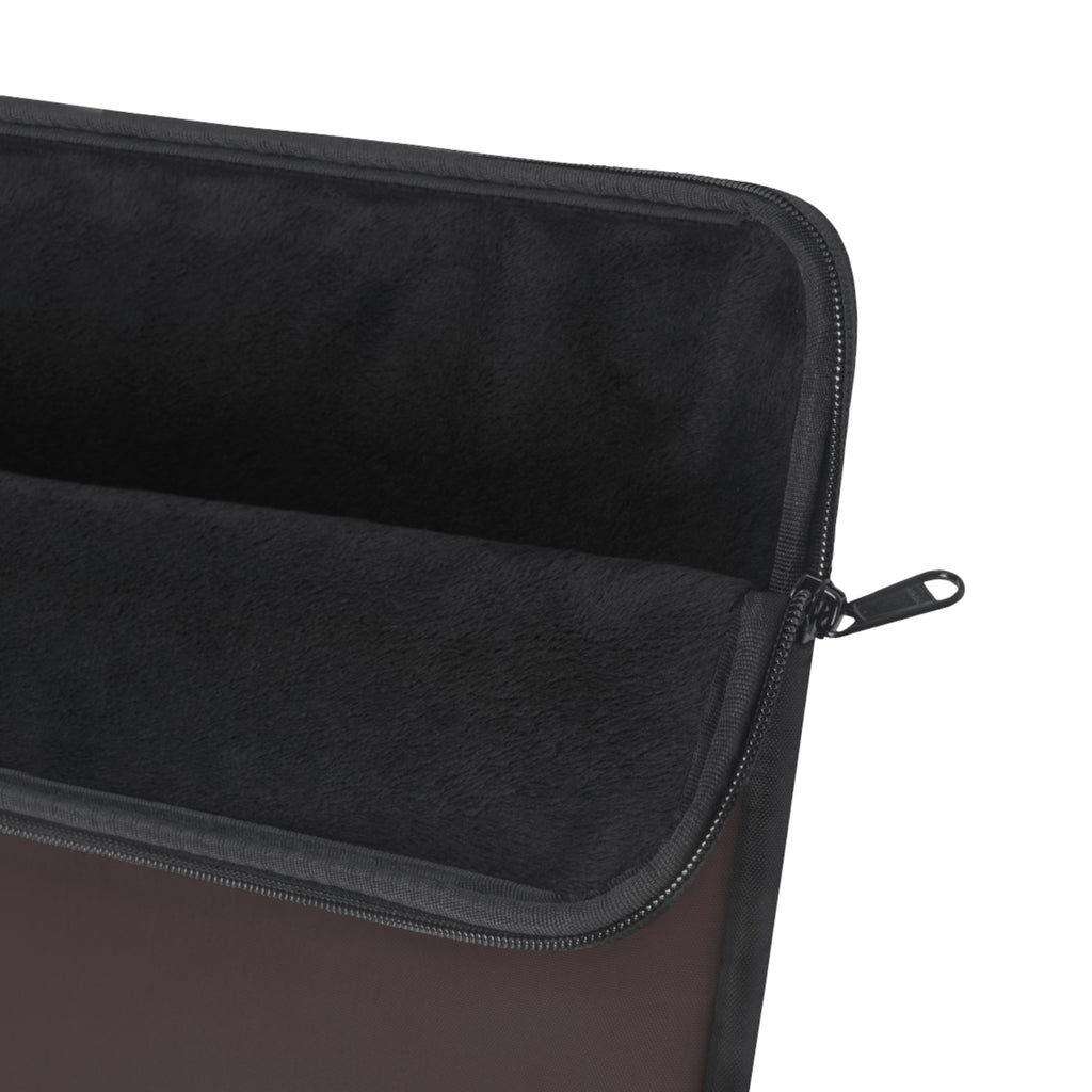 Brown neoprene laptop sleeve interior with zipper track and loop pull.
