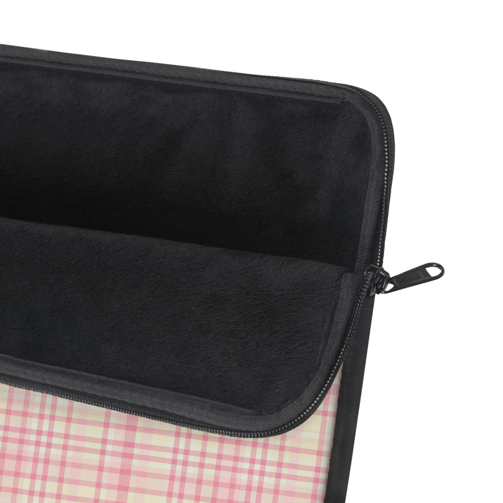 Black-trimmed plaid sleeve with zipper pull on corner, pink-and-cream check