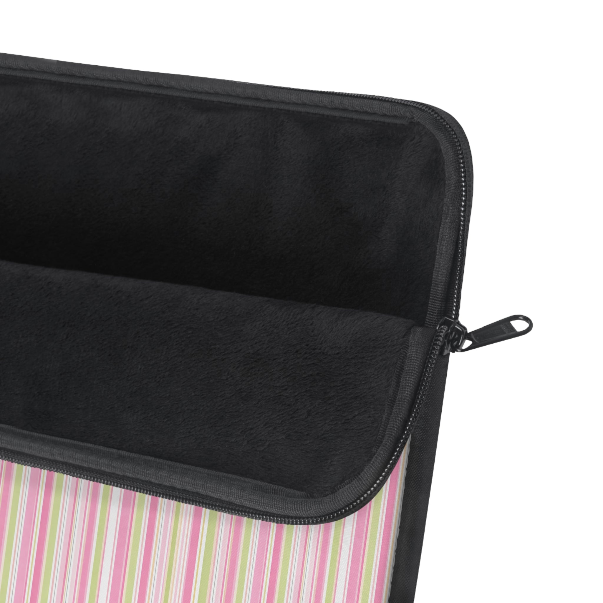 Laptop sleeve with dark interior lining and black zipper edge; colorful vertical stripe panel