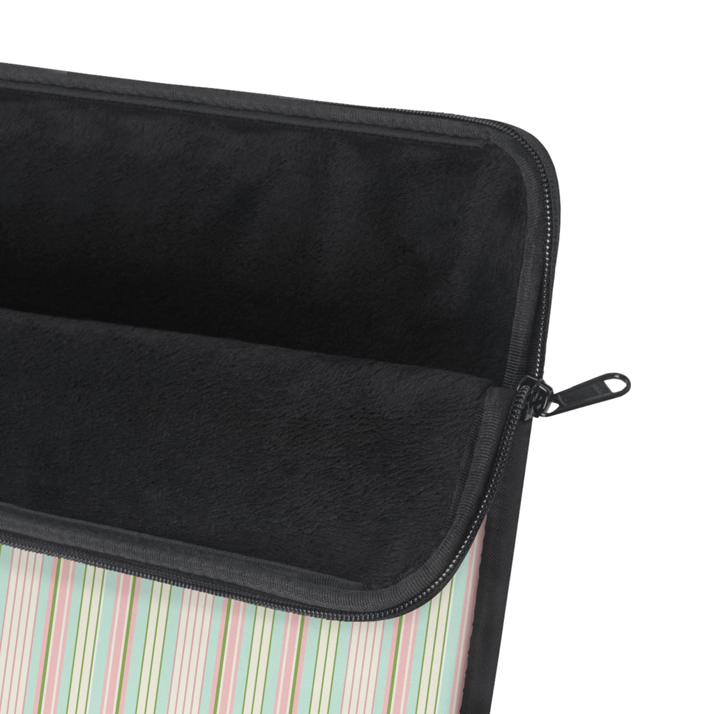 Black-lined sleeve corner with zipper and colorful striped outer fabric