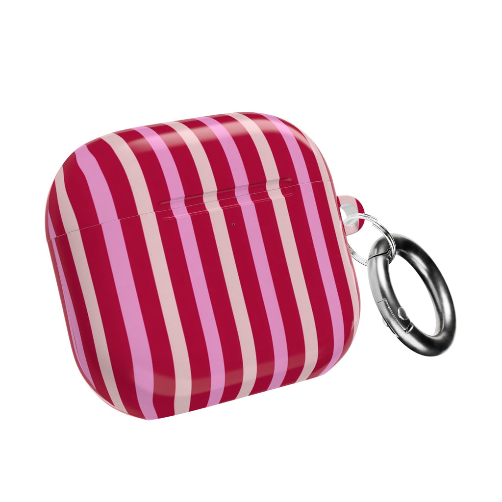 AirPod case with berry-and-blush vertical stripes and metal keyring loop