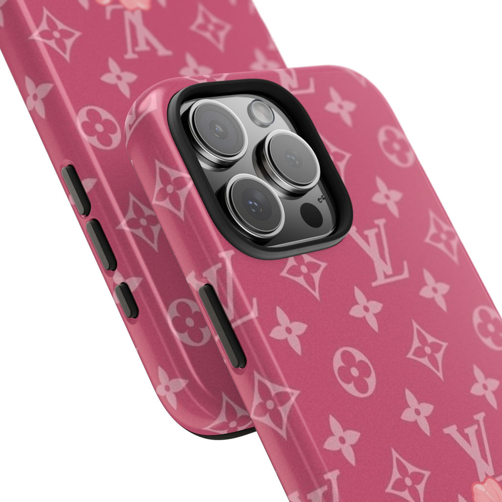 Pink LV monogram hibiscus phone case, angled view with camera bump and side buttons
