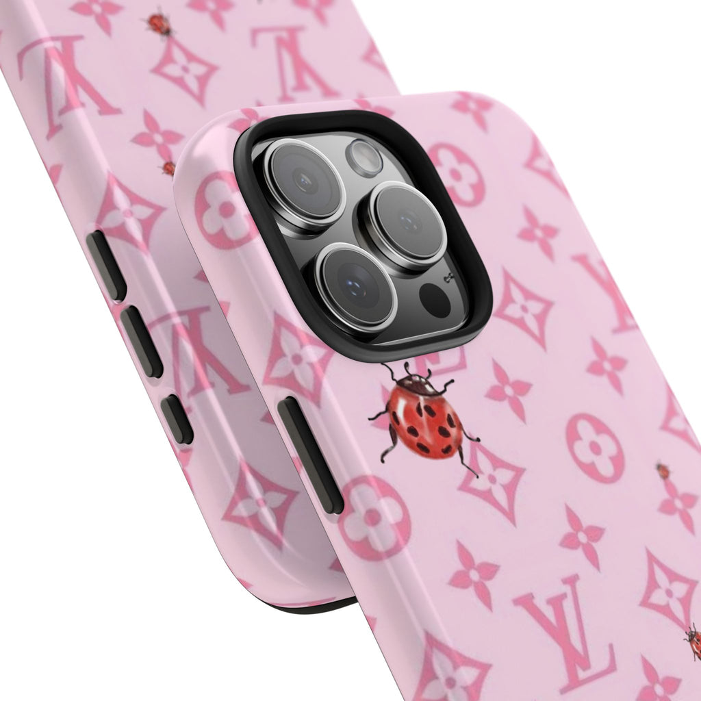Pink phone case showing side buttons and camera lenses, ladybug and LV pattern