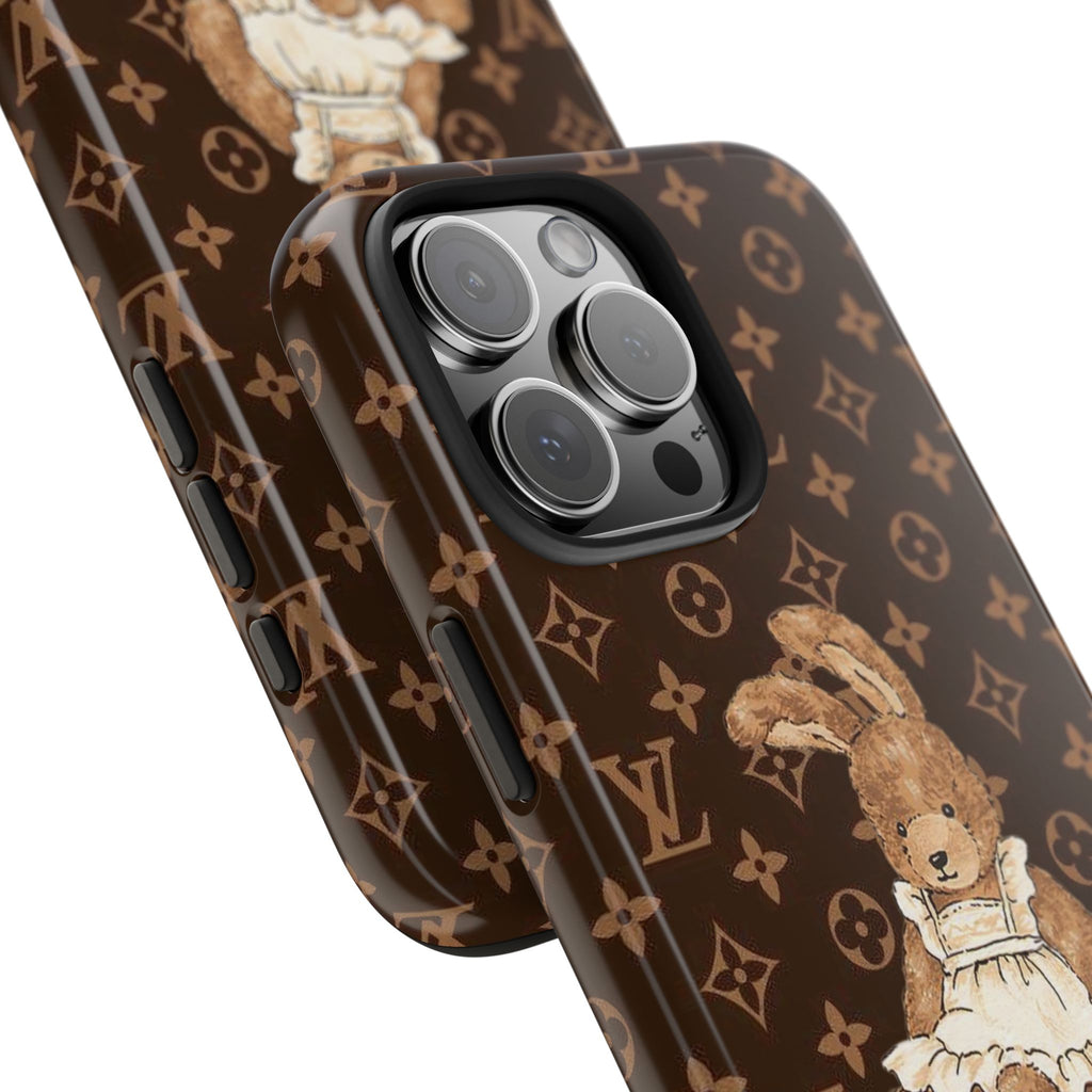 Dark brown phone case close-up: LV monogram and bunny art near camera lenses