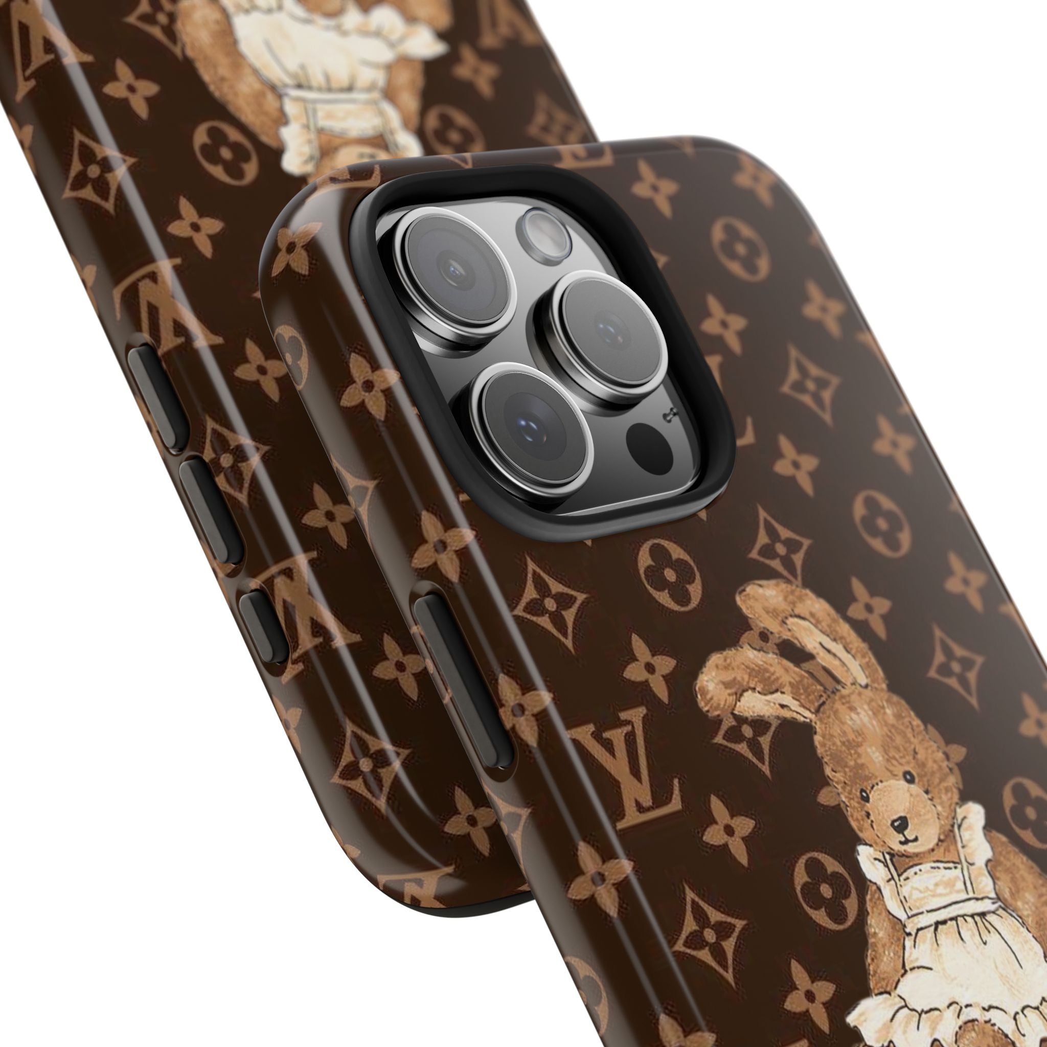 Dark brown phone case close-up: LV monogram and bunny art near camera lenses