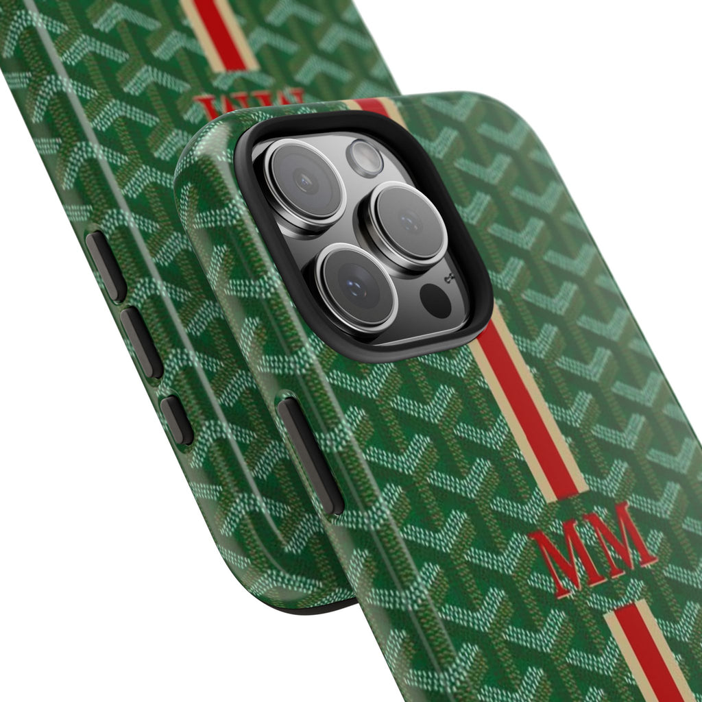 Green Goyard-style phone case with MM monogram, raised camera lenses, red/white stripe