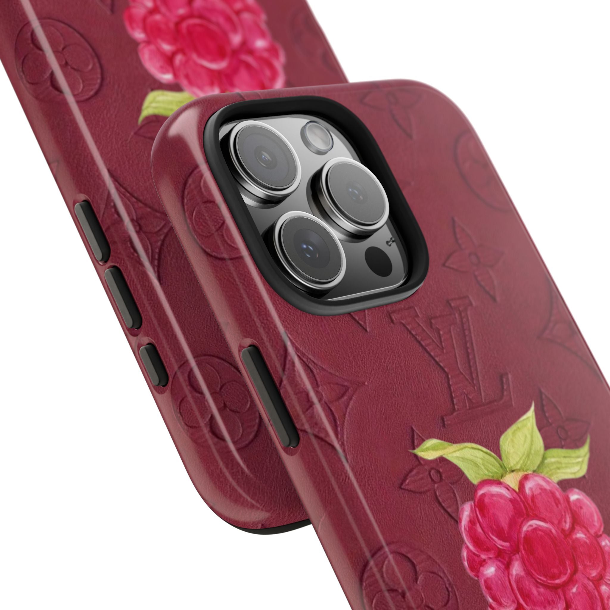 Raspberry phone case close-up with embossed pattern, raised camera protection and buttons