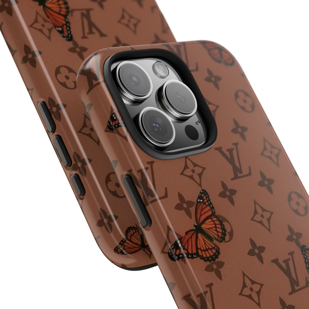 Mocha brown phone case corner view with LV monogram, butterfly print, and camera lens cutout