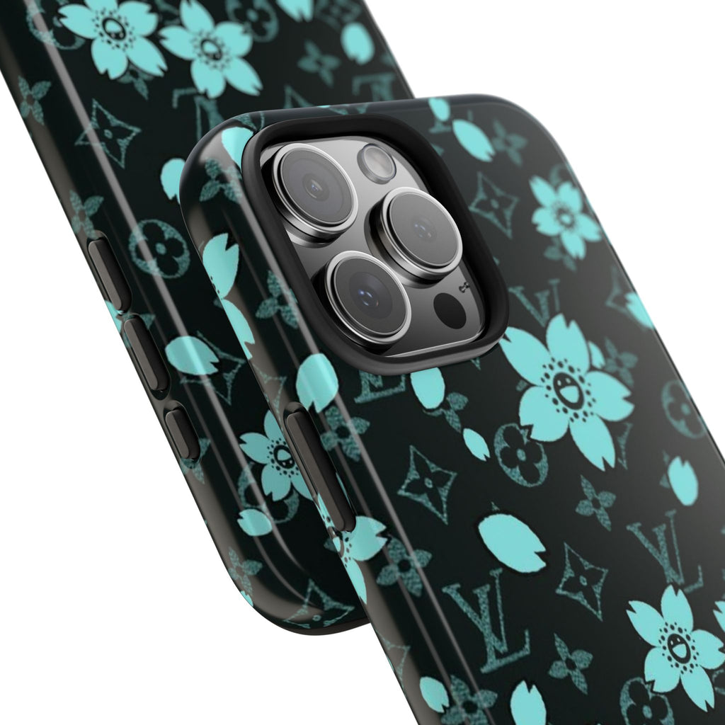 Black phone case close-up with turquoise floral and LV monogram pattern; camera lens cover