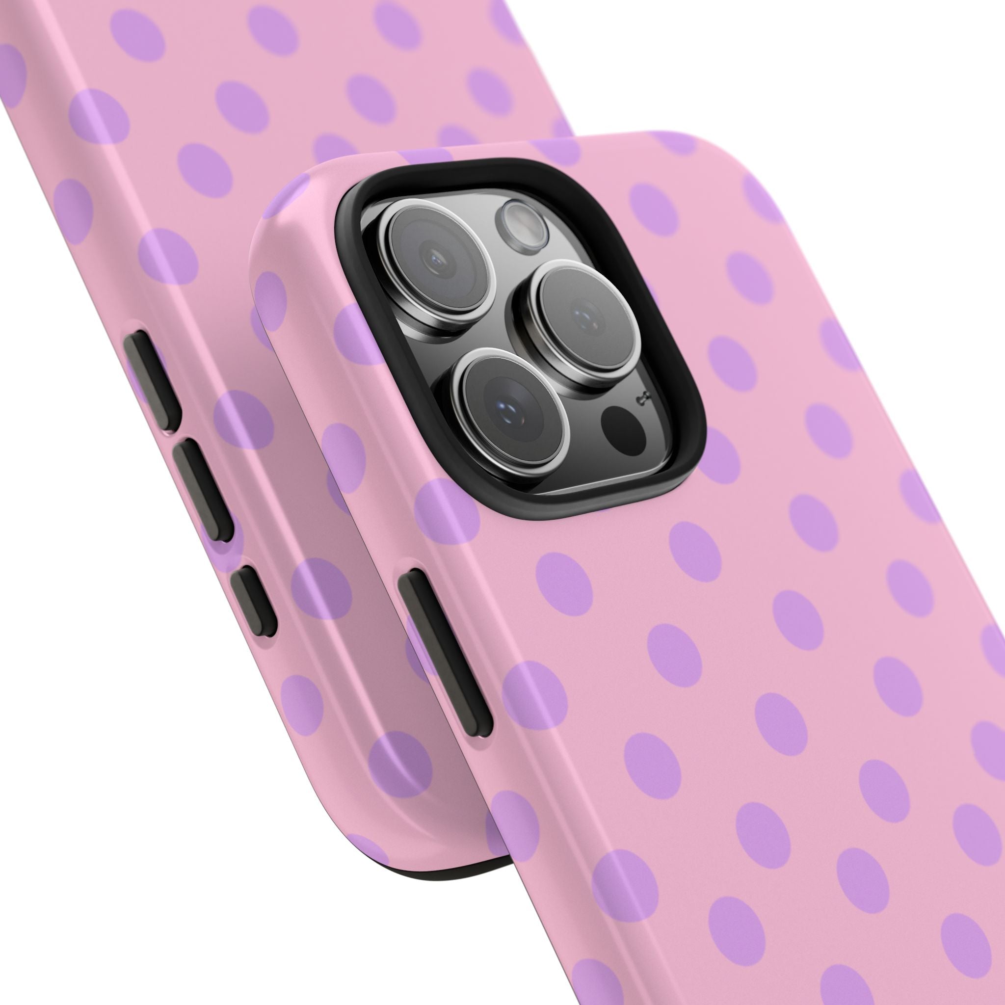 Pink phone case with lavender polka dots, close-up camera cutout and side buttons