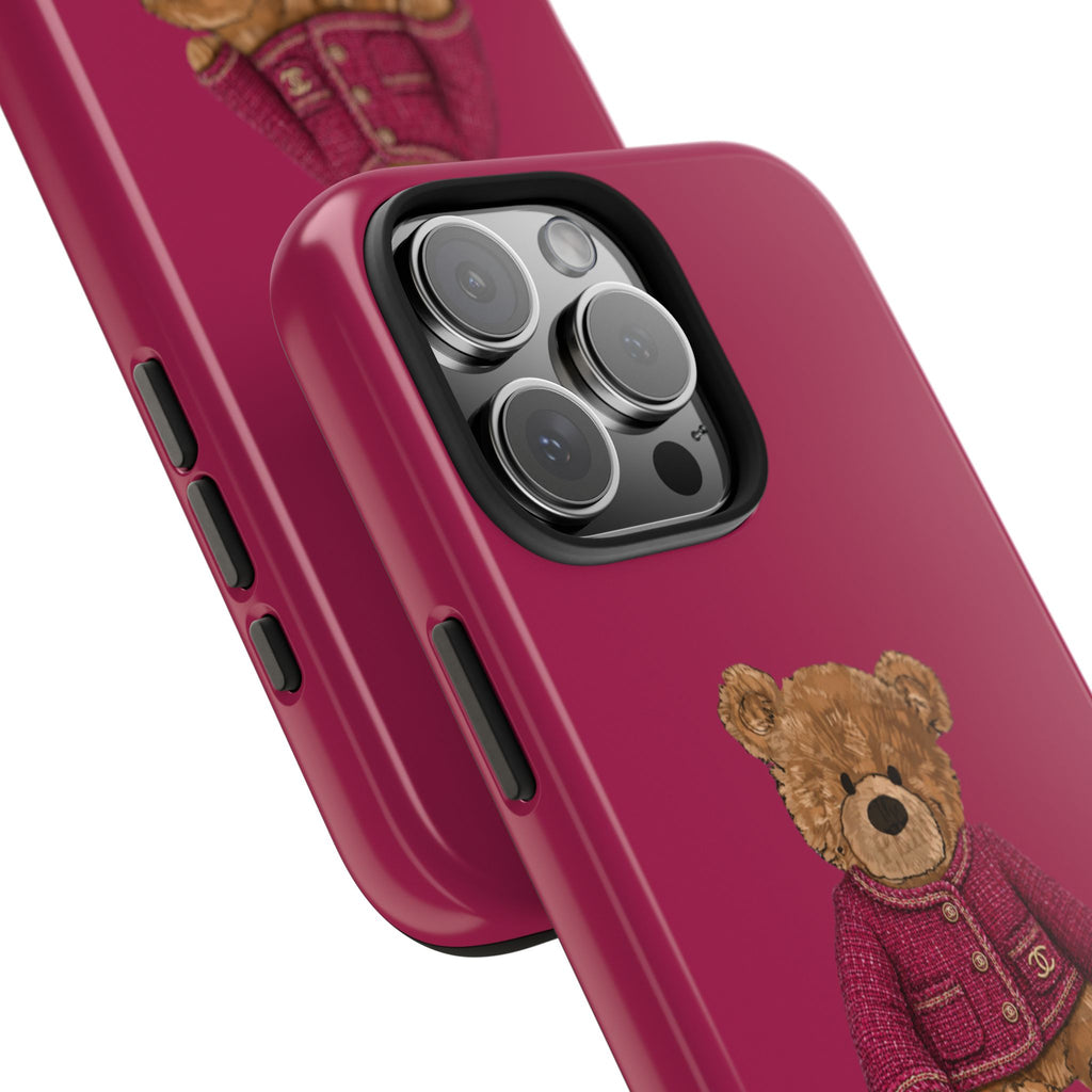 Raspberry pink phone case corner with camera lenses and teddy bear embroidery on side