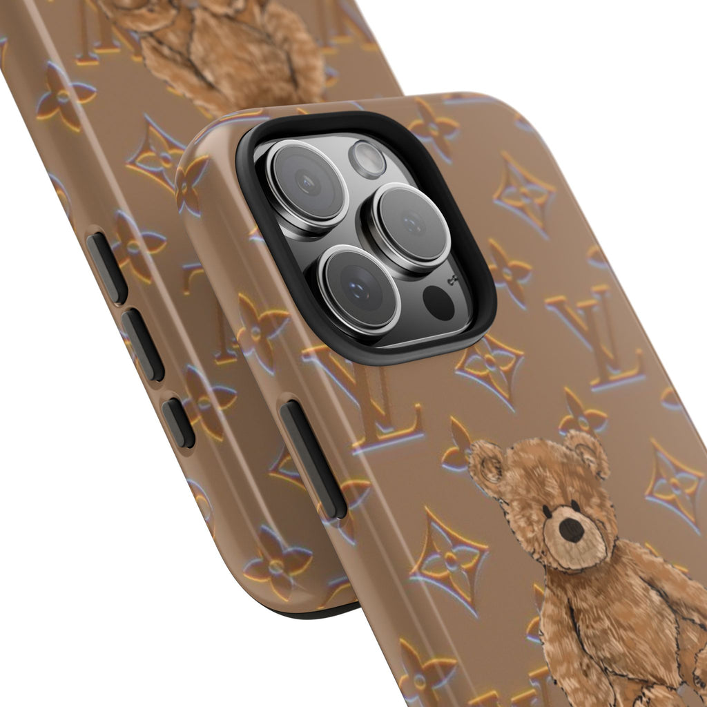 Taupe phone case close-up with teddy bear detail, camera lens cutout and side buttons.