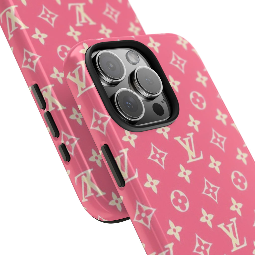 Angled pink phone case with LV monogram pattern and camera lens cutout