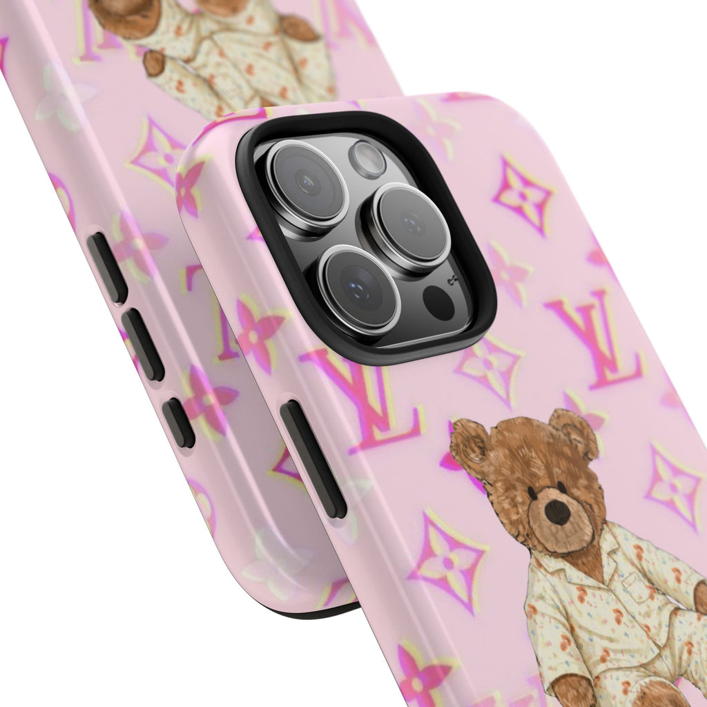 Pink phone case pair showing teddy bear artwork and camera lens cutout