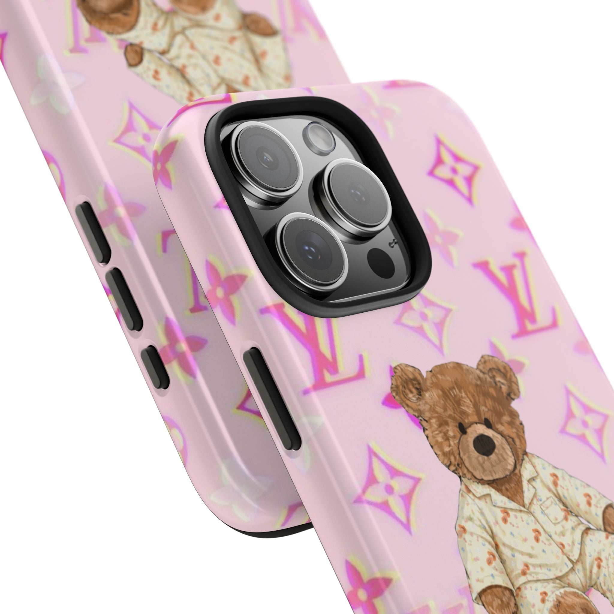 Pink phone case pair showing teddy bear artwork and camera lens cutout