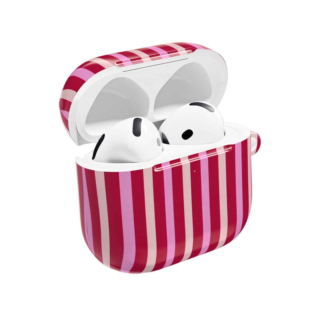 AirPod case with berry-and-blush vertical stripes, open lid showing white earbuds