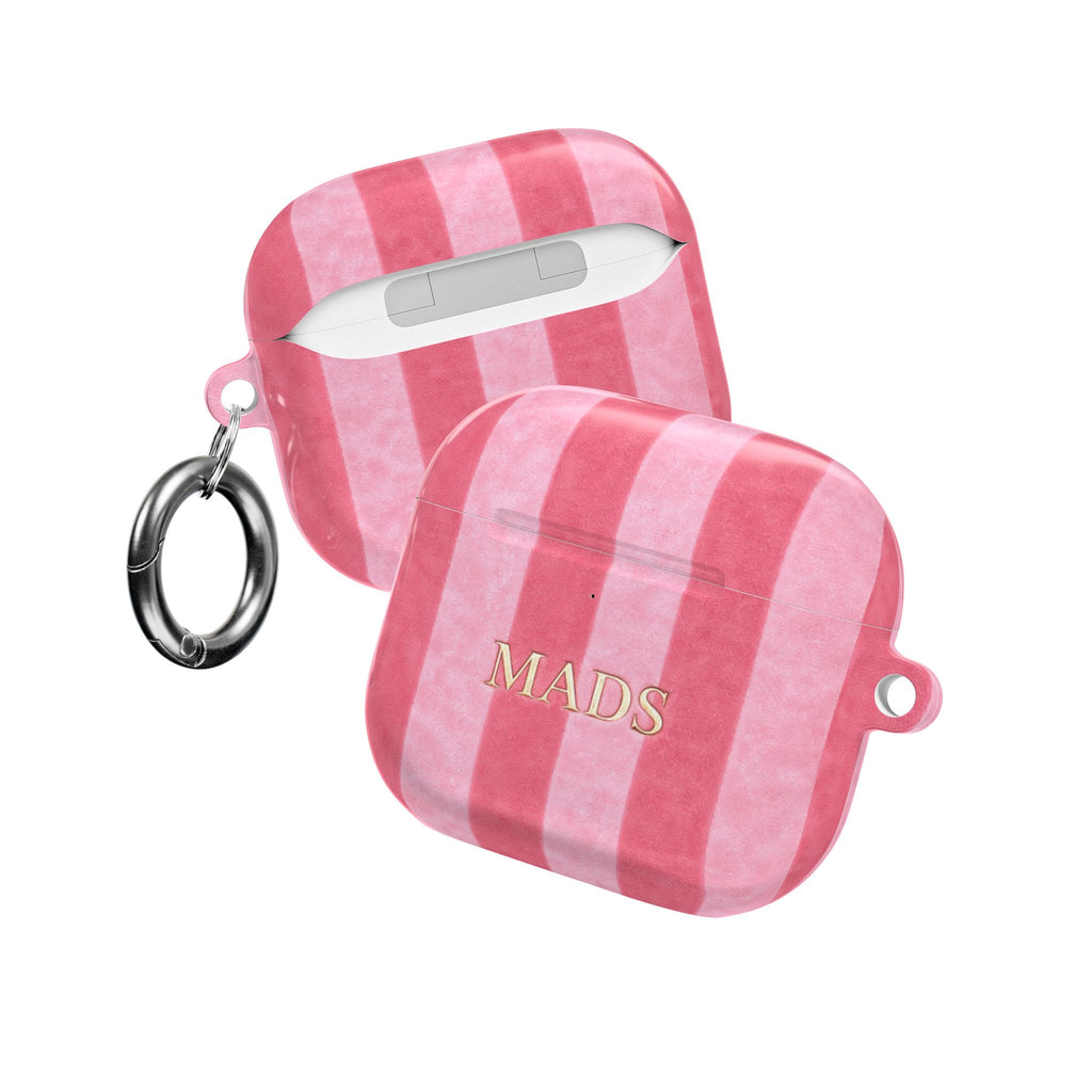 Pink velvet AirPods case with plaid stripes, “MADS” print, and metal key ring clip.