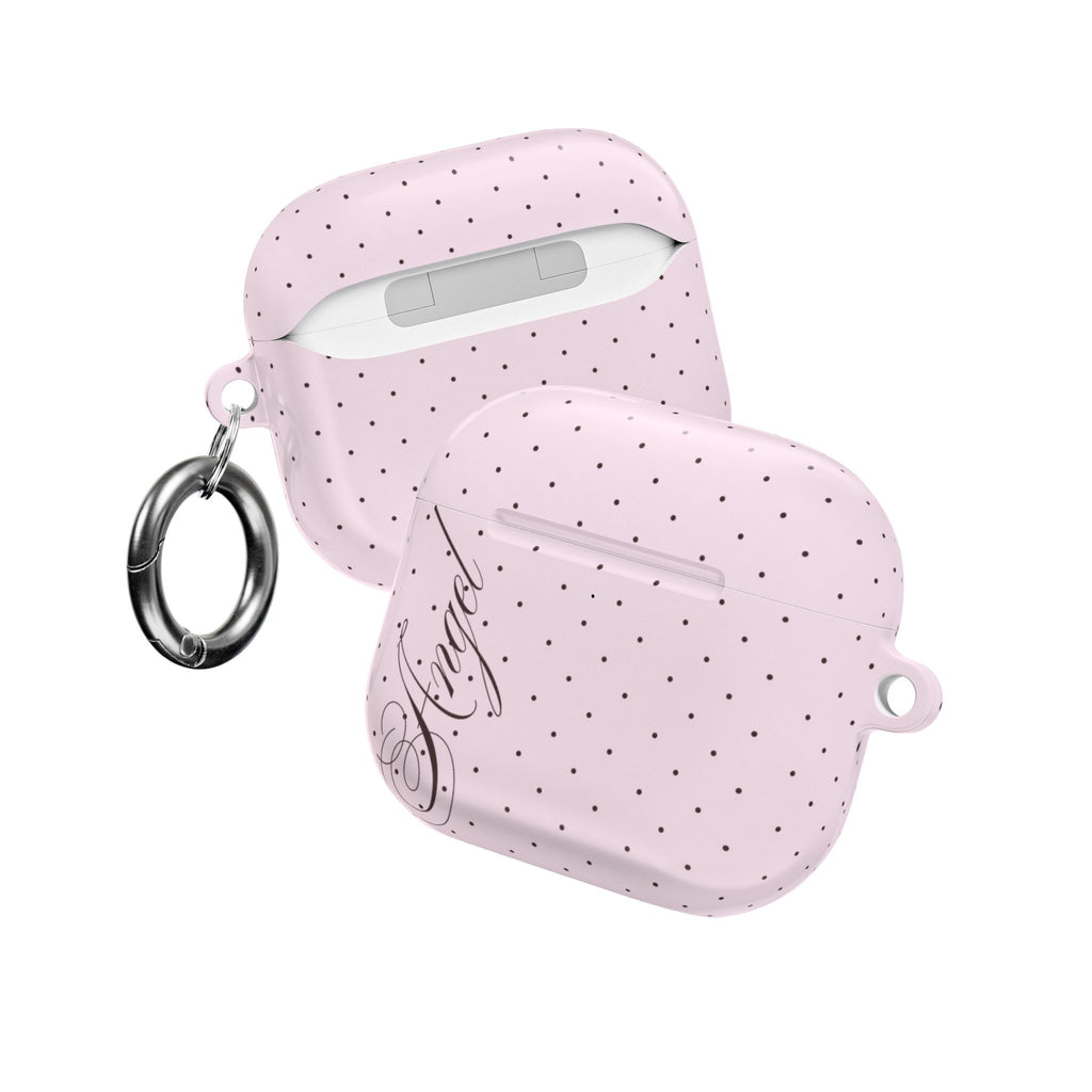 Pink polka dot AirPods case with wrist strap and black script artwork