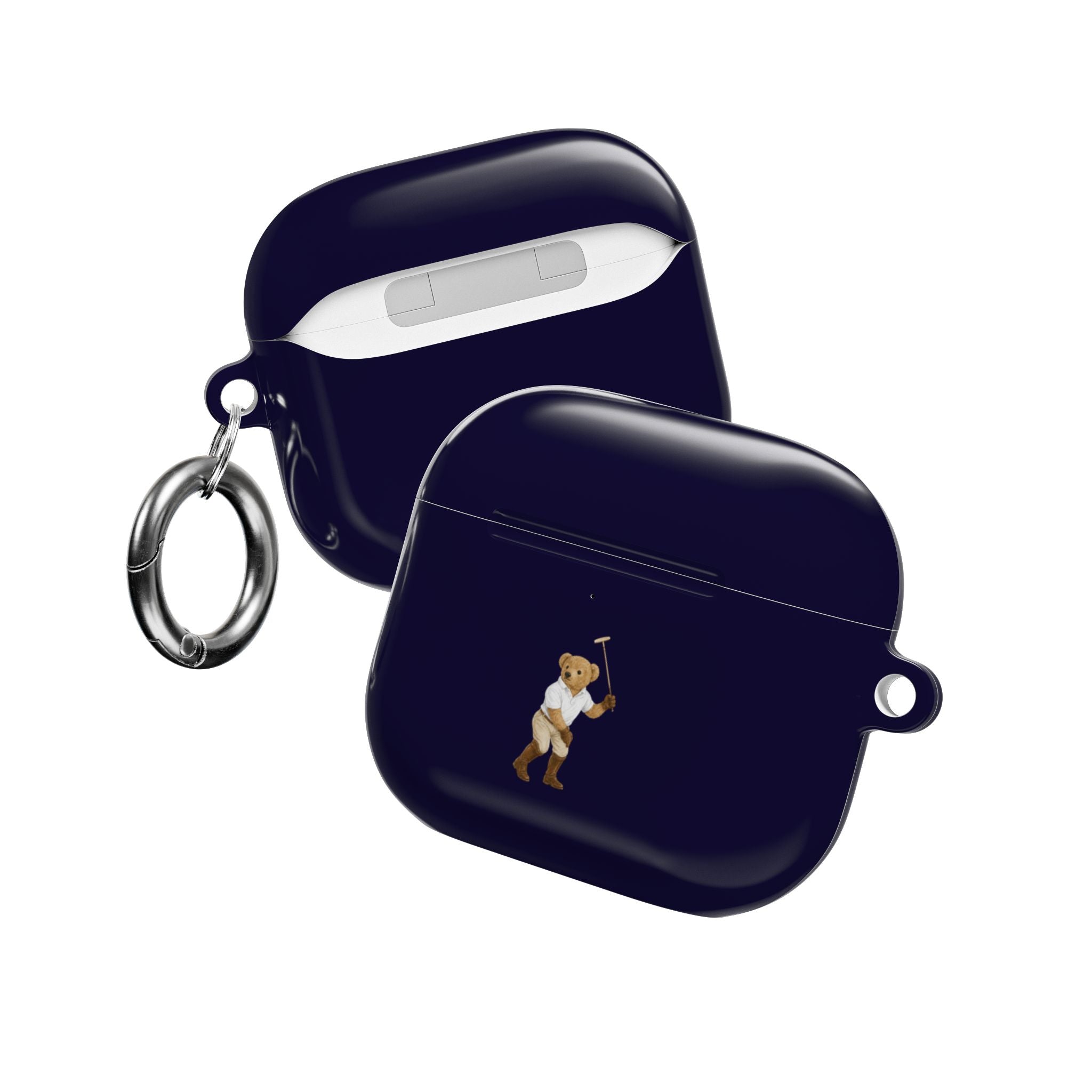 Navy blue AirPods case with teddy bear graphic and metal key ring, angled view