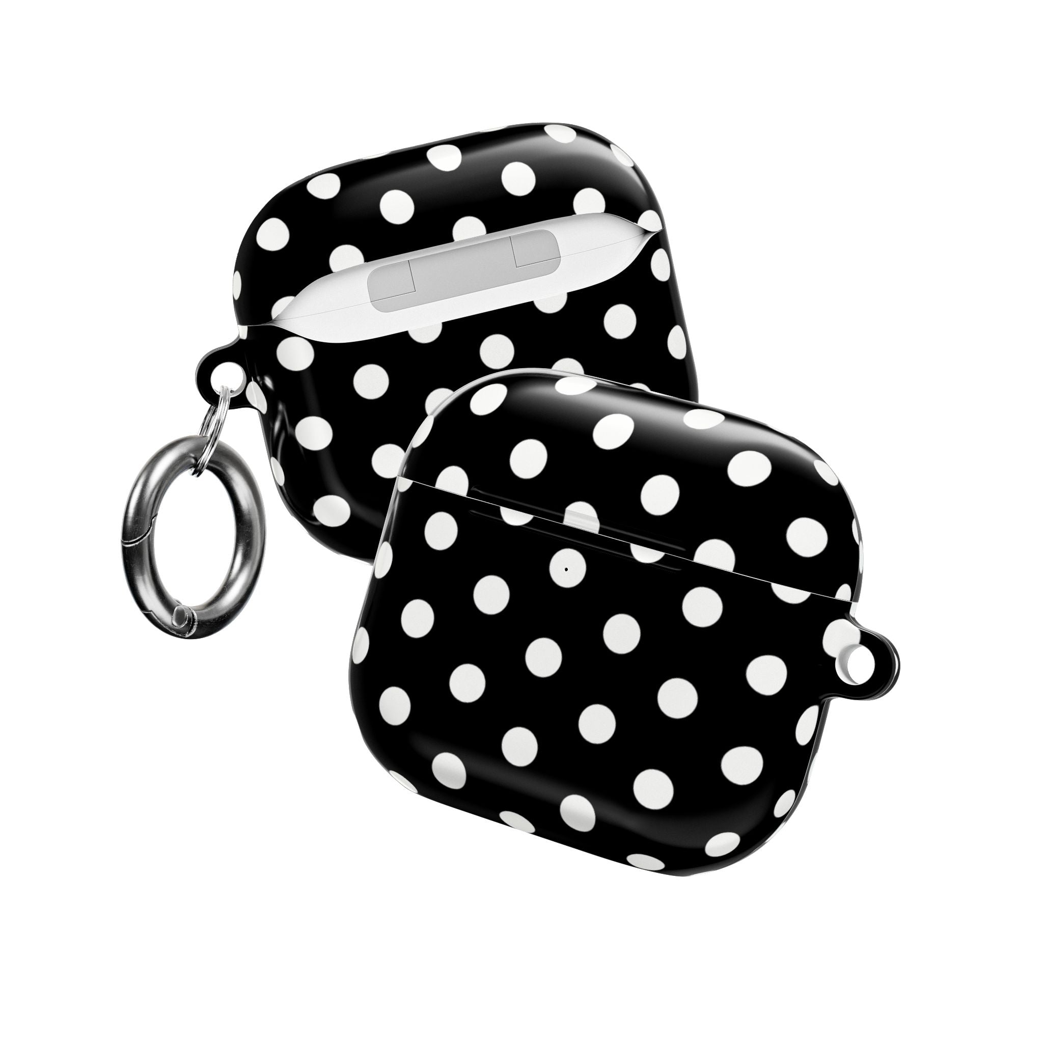 AirPods cases with two keyrings, black shells with white polka dots