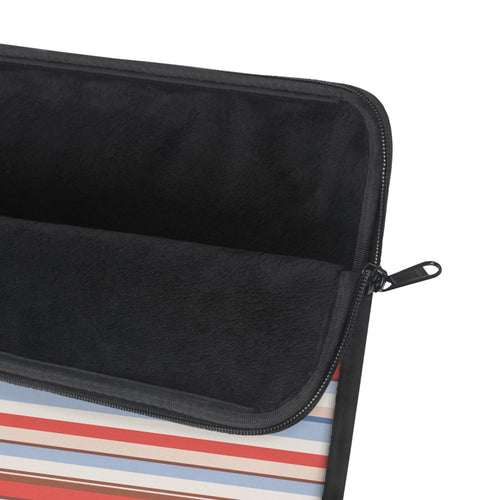 Neoprene device sleeve with black interior lining and black zipper on striped exterior
