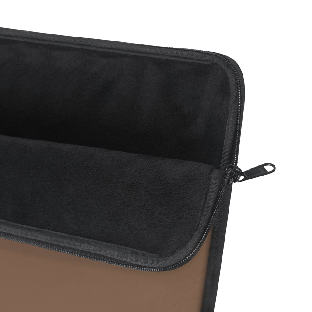 Black-lined interior of brown sleeve with zipper closure and stitched seam