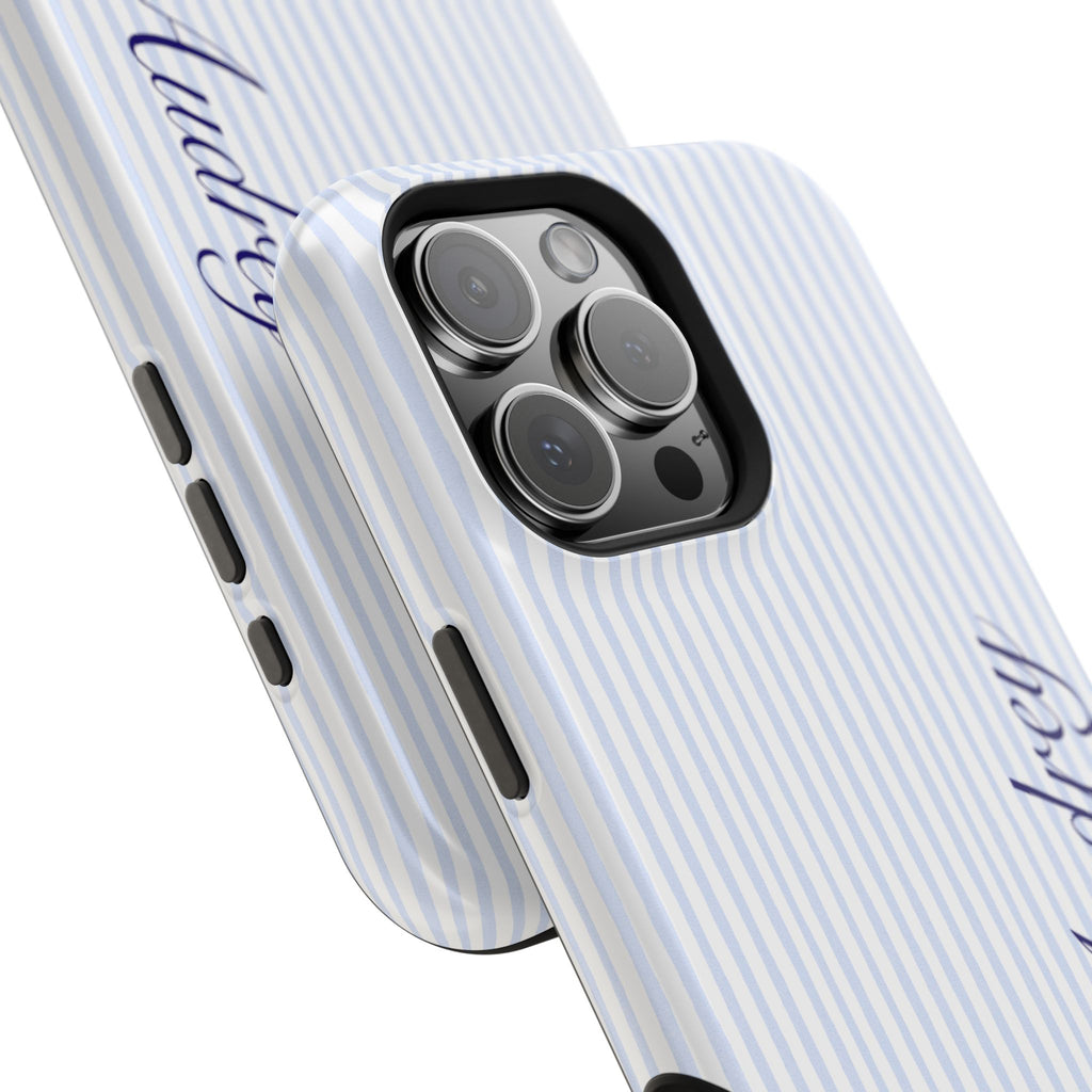 Blue striped phone case close-up with blue cursive custom name and camera lenses