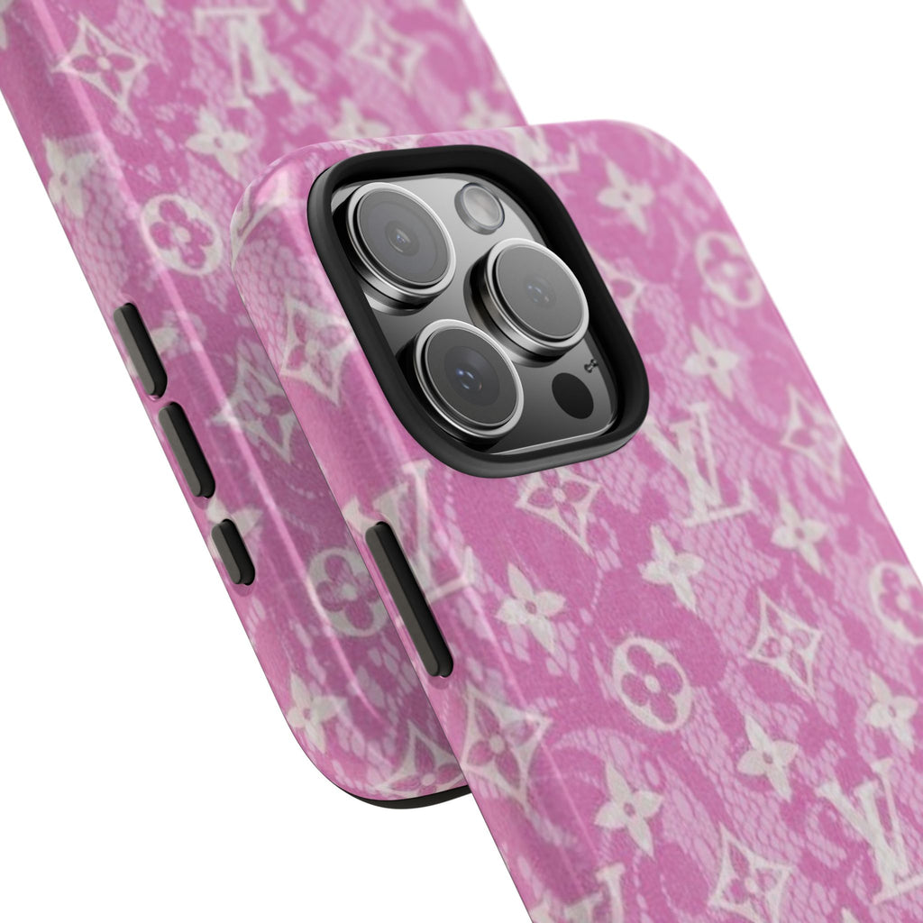 Pink LV phone case with white monogram pattern; side buttons and camera bump visible