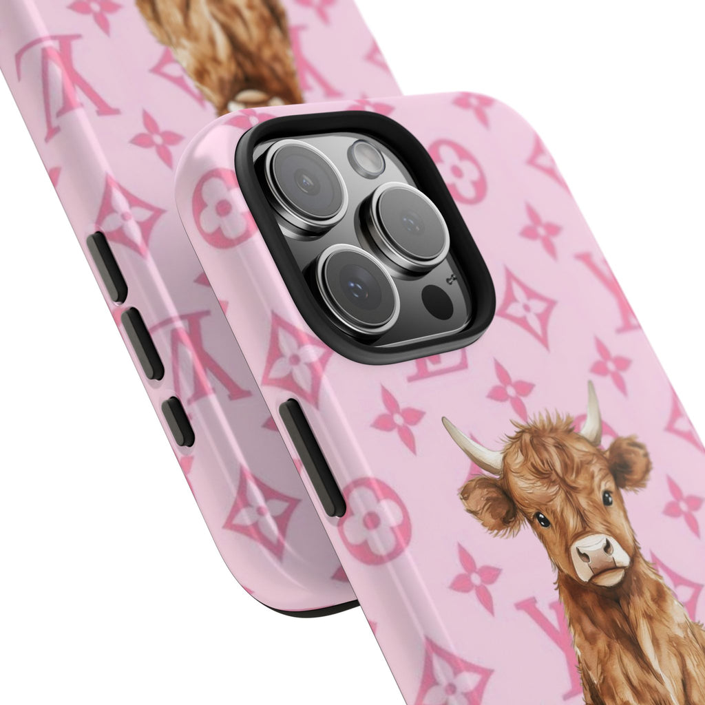 Pink LV phone case close-up with highland cow print, raised camera rings, and side cutouts
