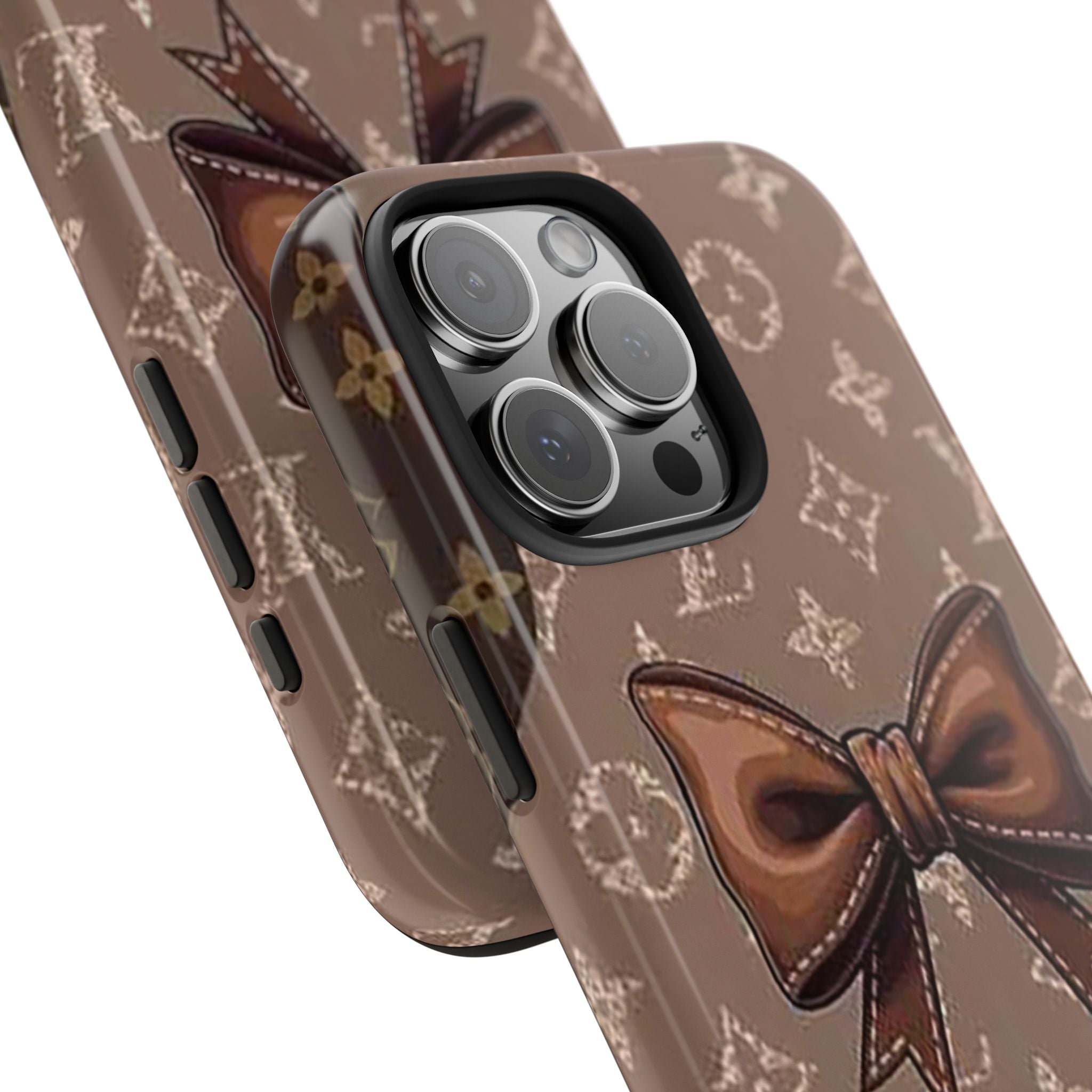 Brown LV phone case angled close-up: bow trim and camera cutouts
