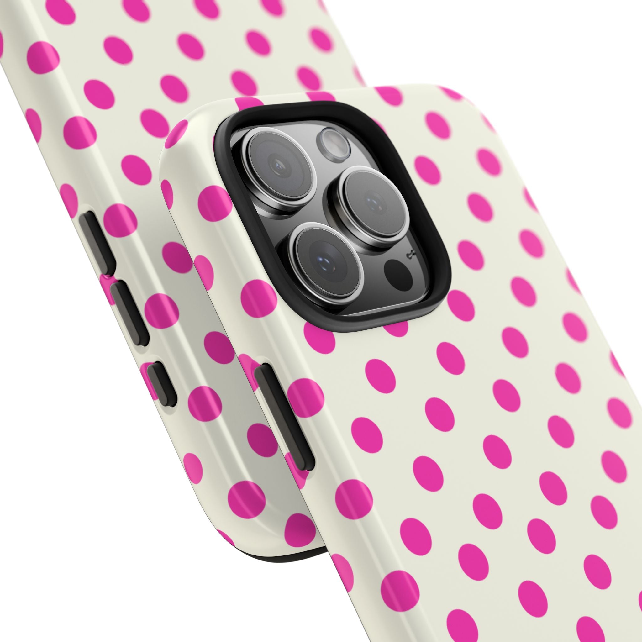 Cream polka dot phone case angled side view with magenta dots and camera bumps