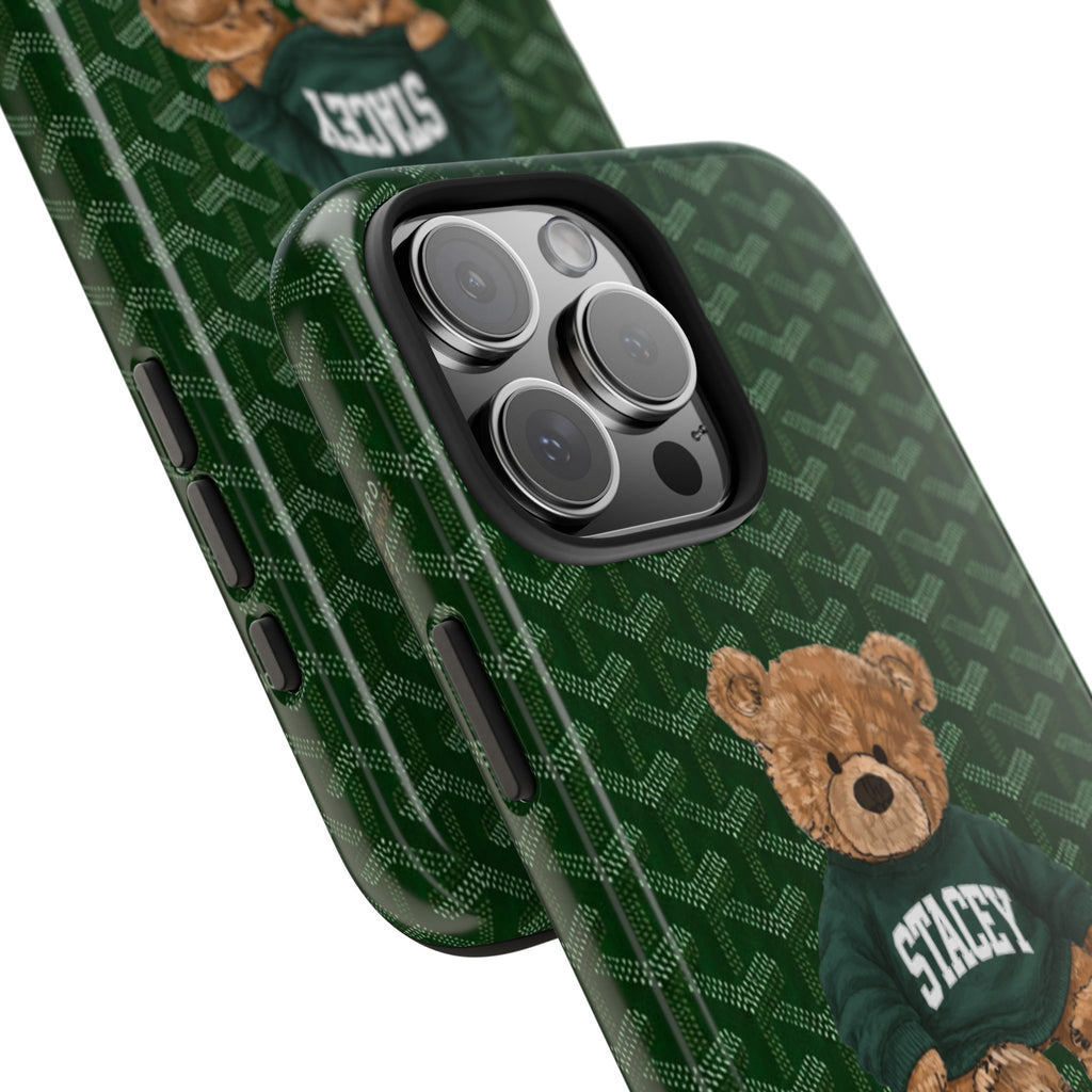 Green phone case close-up with camera lenses and teddy bear in Stacey shirt.