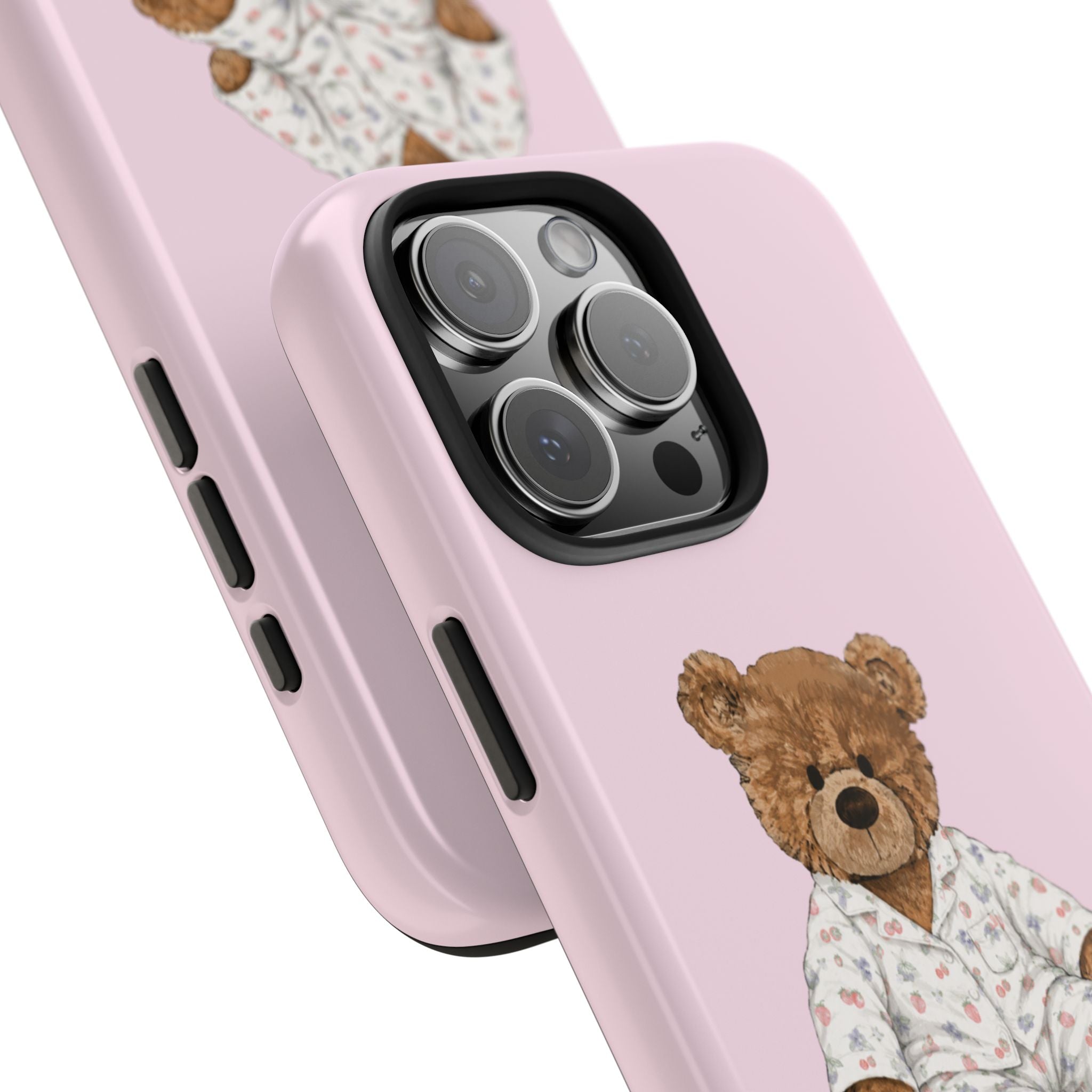 Pink phone case with teddy bear pajama graphic and rear camera close-up