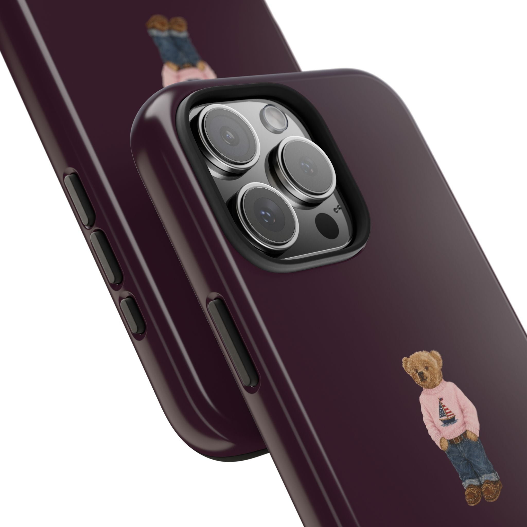 Burgundy teddy bear sailor phone case close-up showing camera cutout and bear