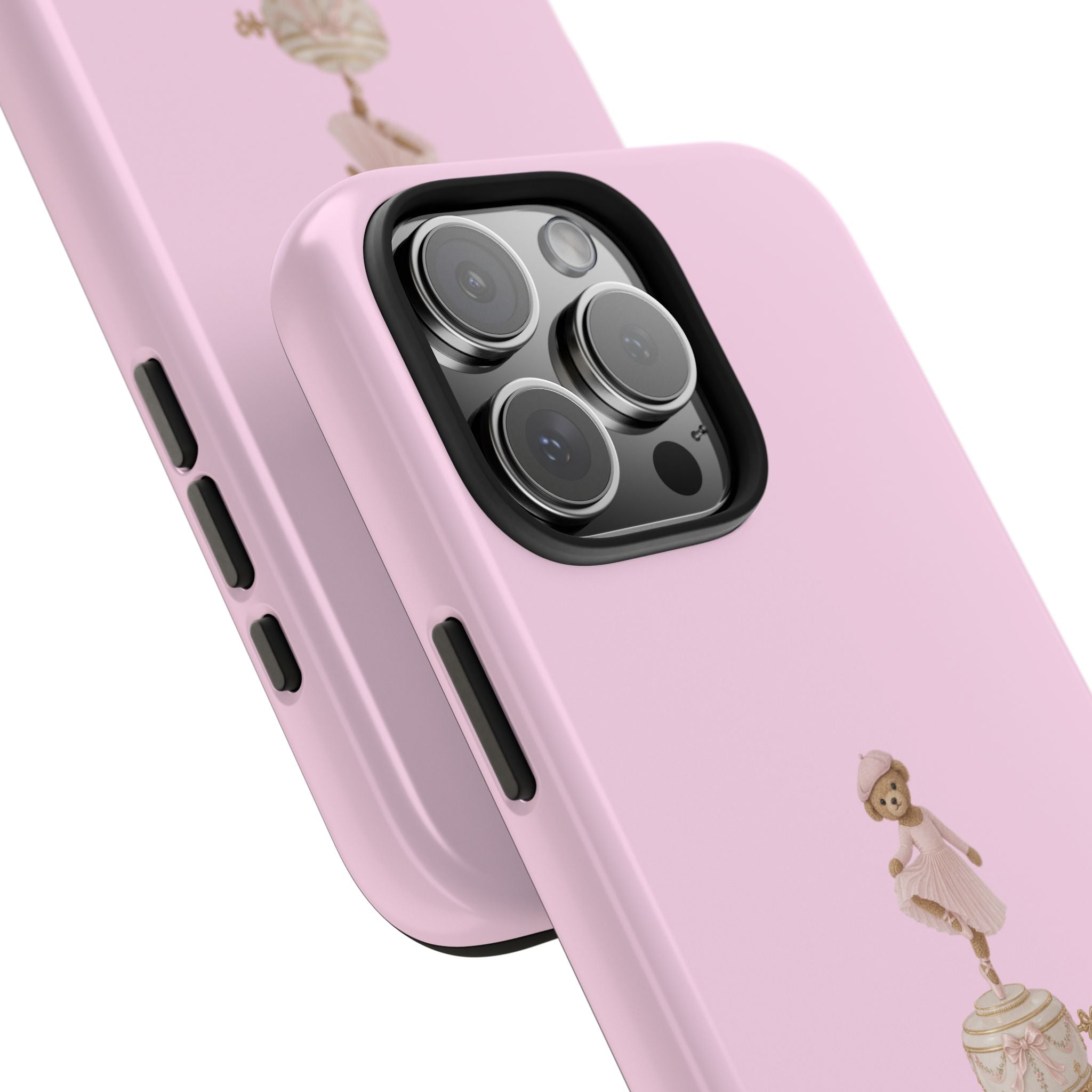 Pink phone case showing camera cutout and ballerina teddy bear music box graphic