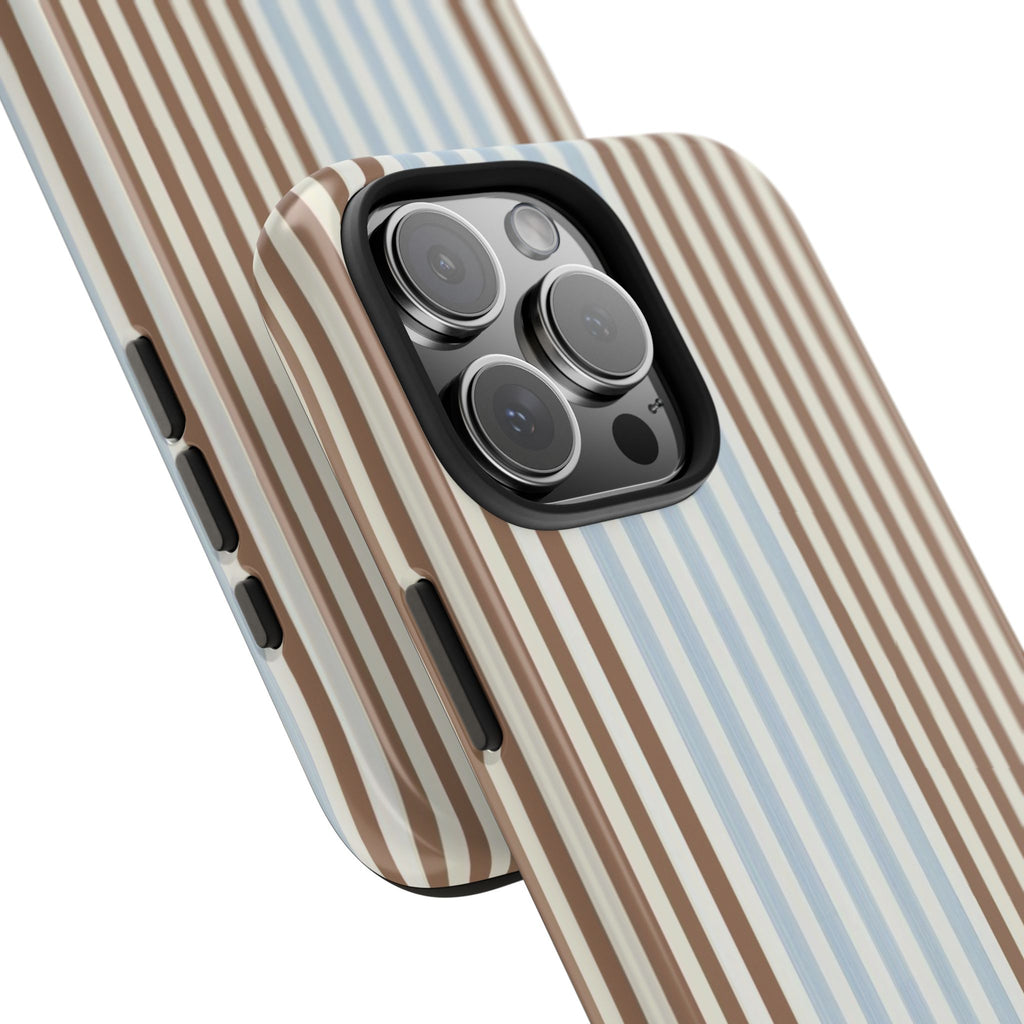 Brown and blue striped teddy bear phone case close-up of camera lenses