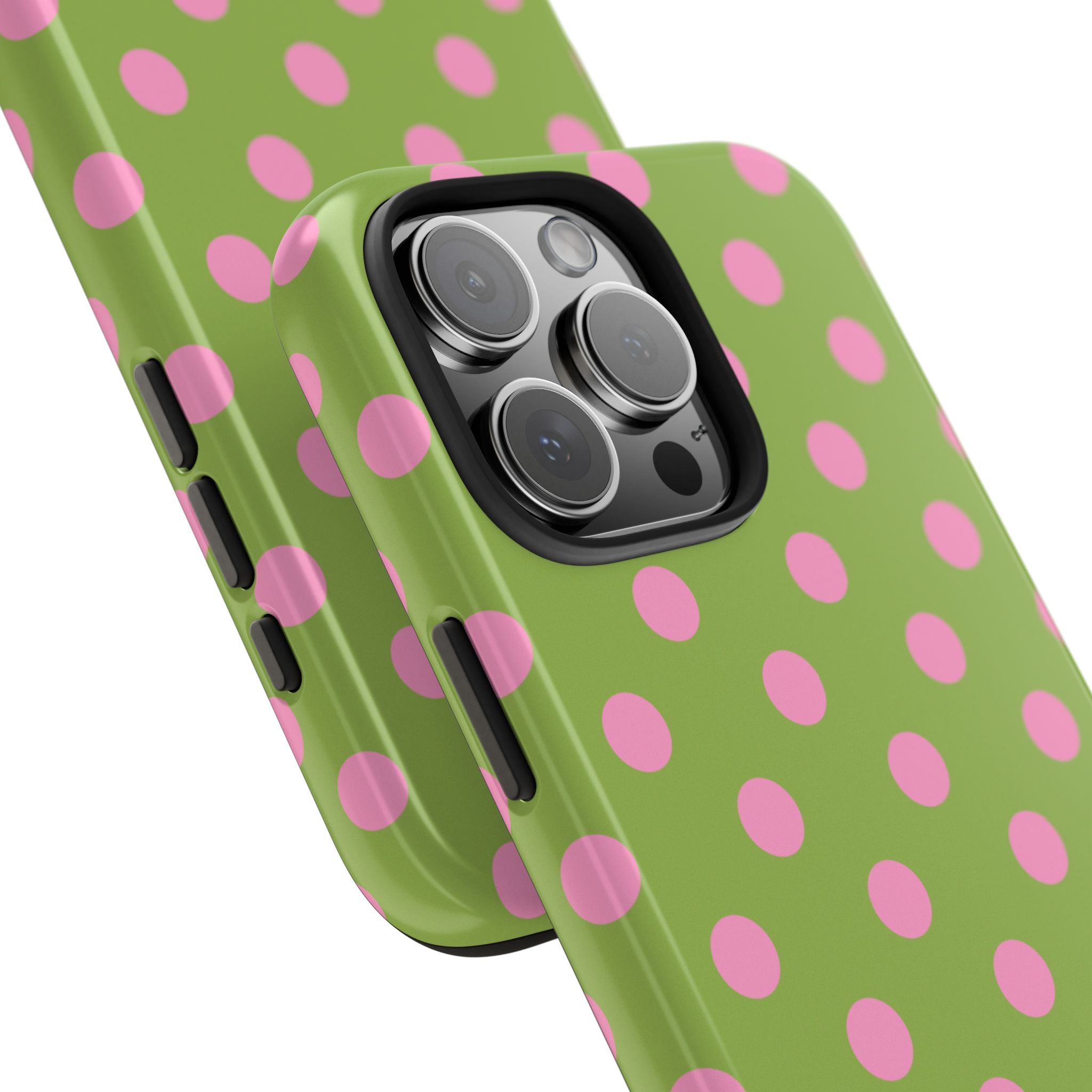Green phone case with pink polka dots, close-up of triple camera cutout