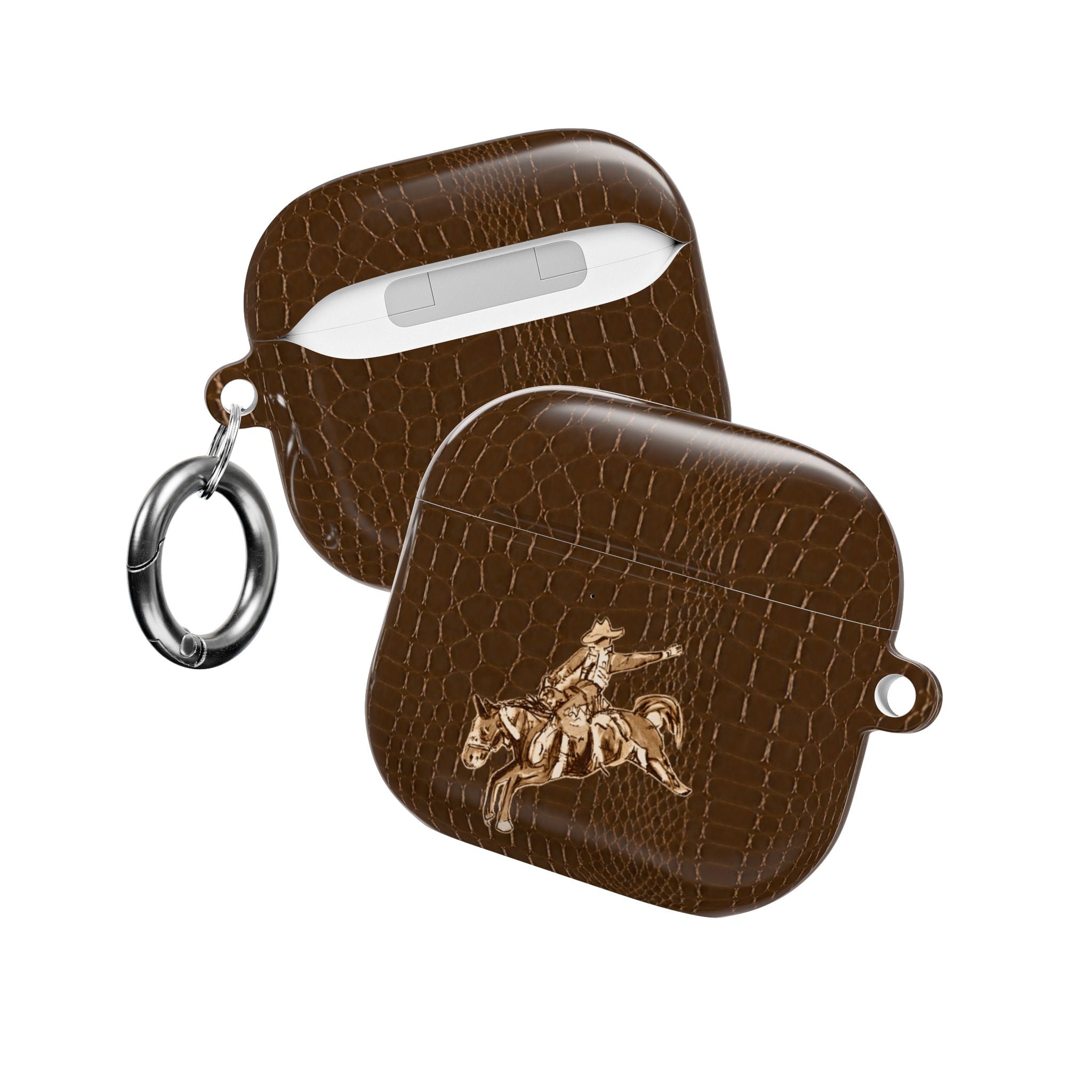 Two brown croc-texture AirPod cases with cowboy rider; key ring on one.