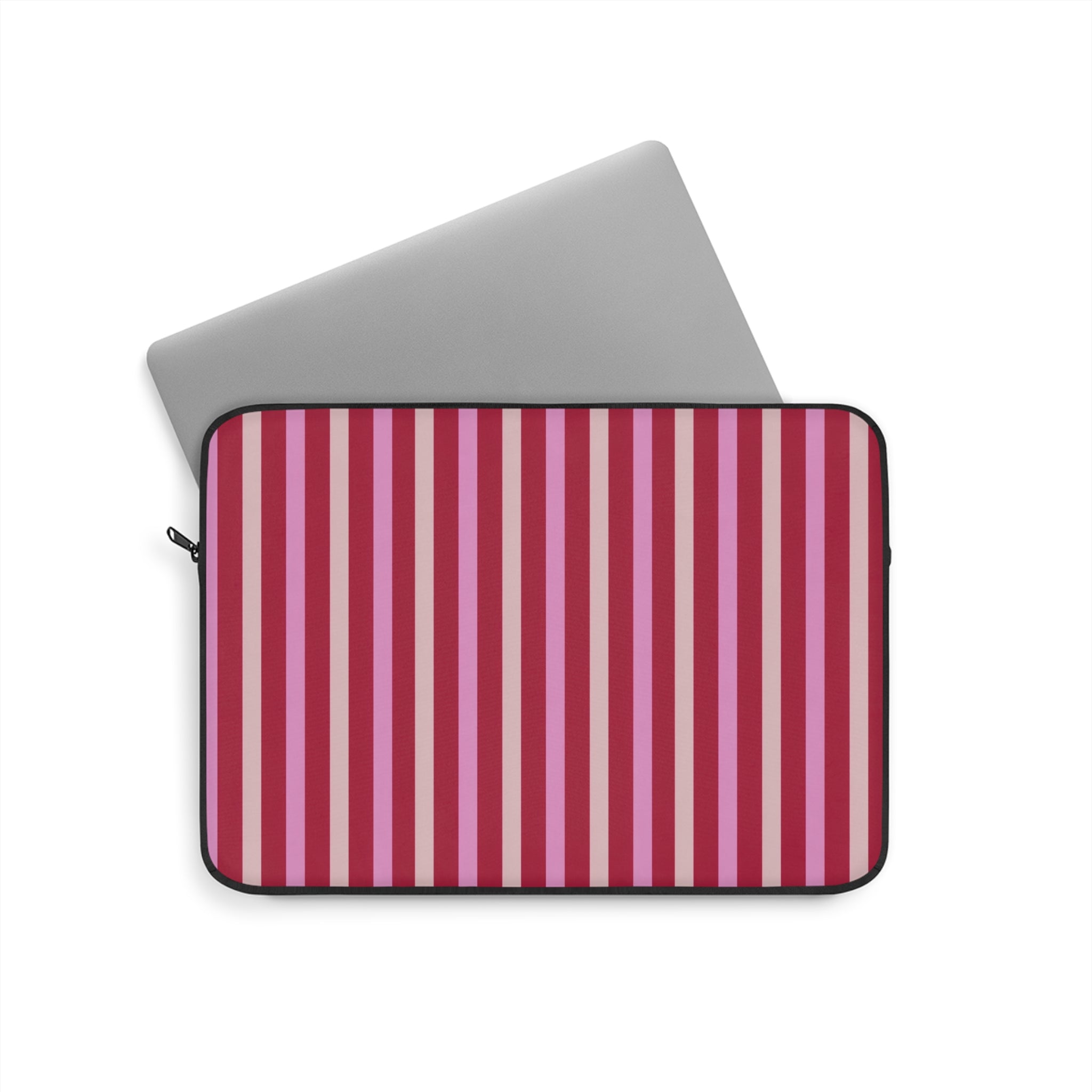 Pink, white, and red striped device sleeve with zipper and dark trim