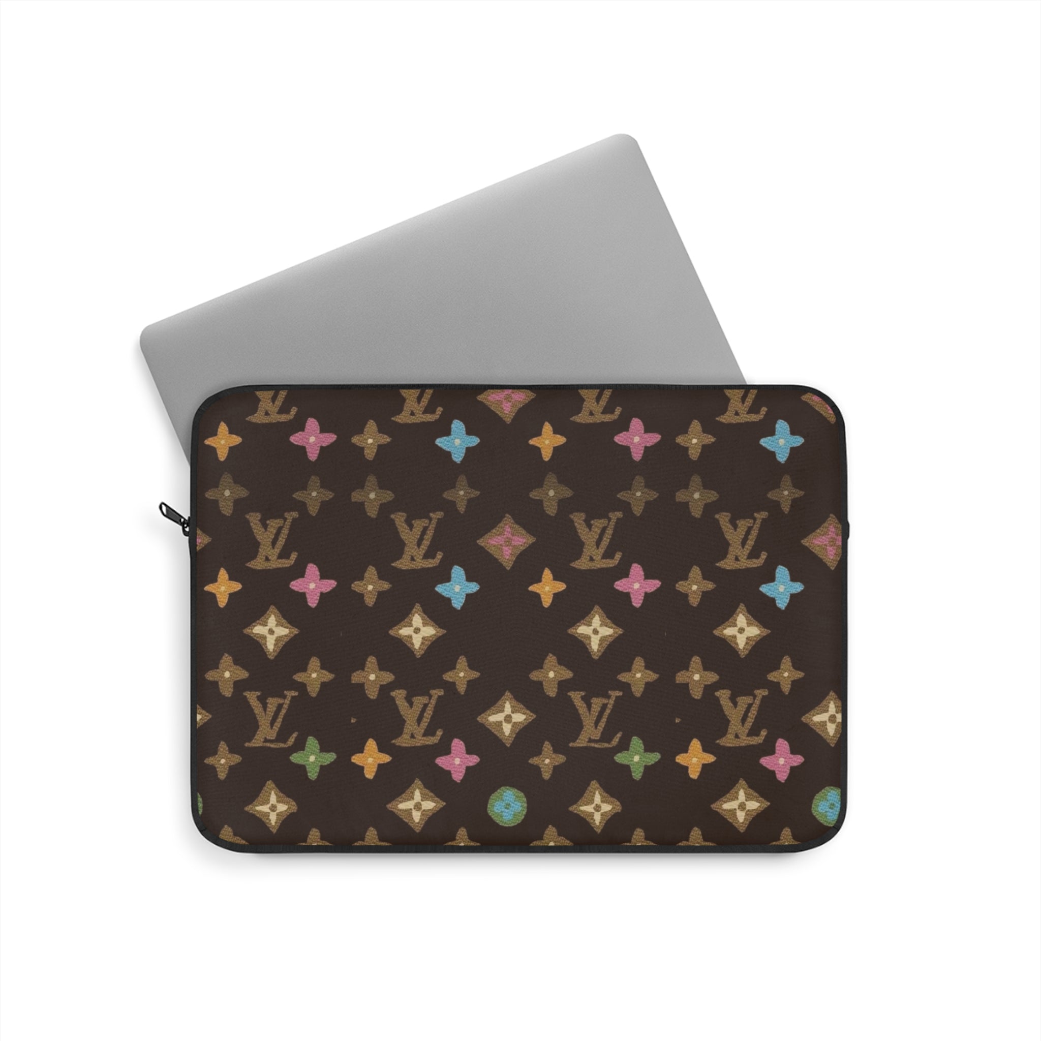 Brown laptop sleeve with multicolor monogram star pattern, zippered top and carrying strap.