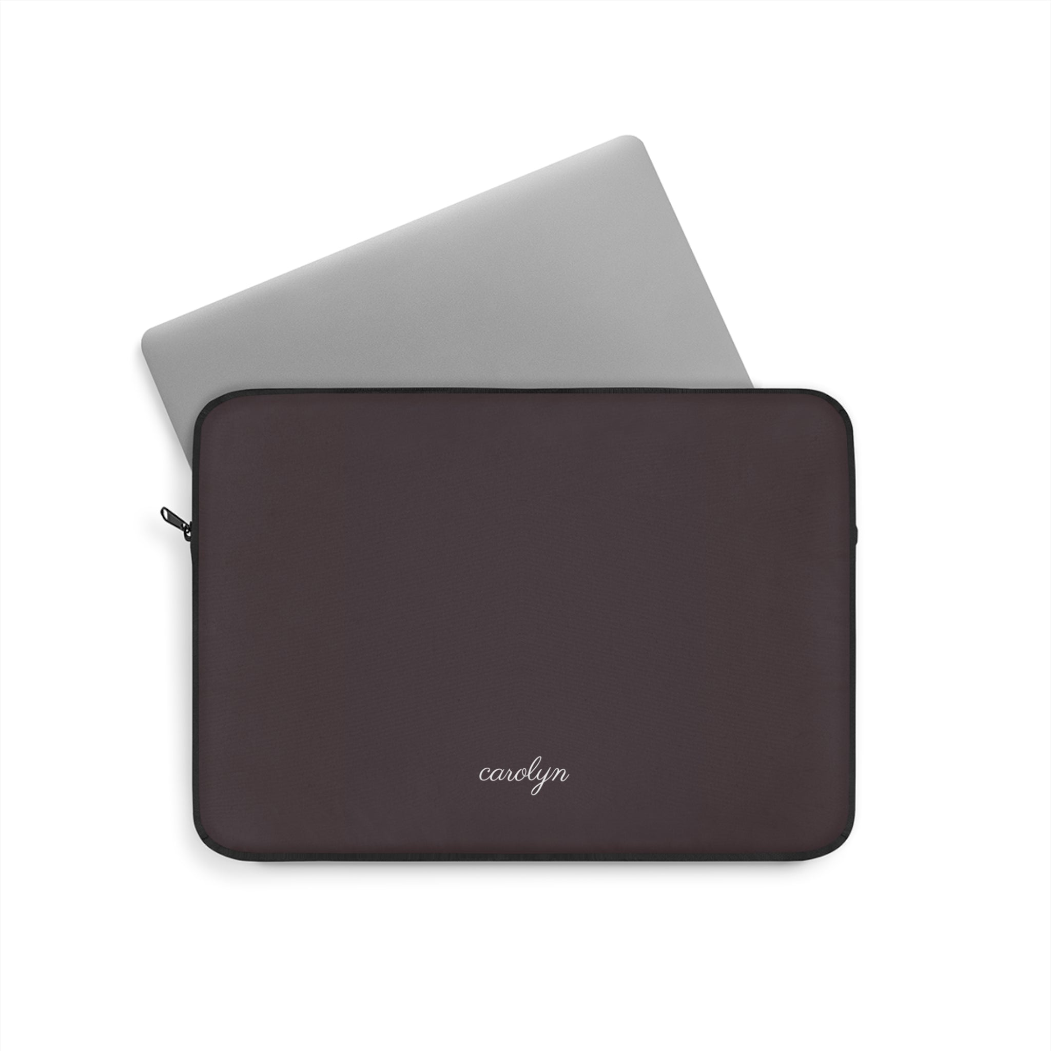 Dark plum laptop sleeve with zipper and embroidered name "carolyn"