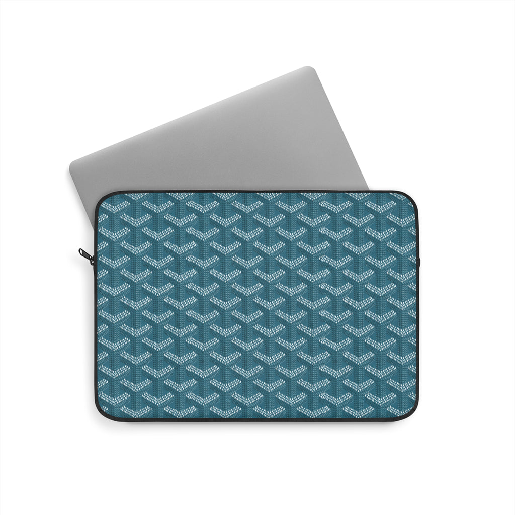 Teal laptop sleeve with geometric lattice pattern and zippered top opening