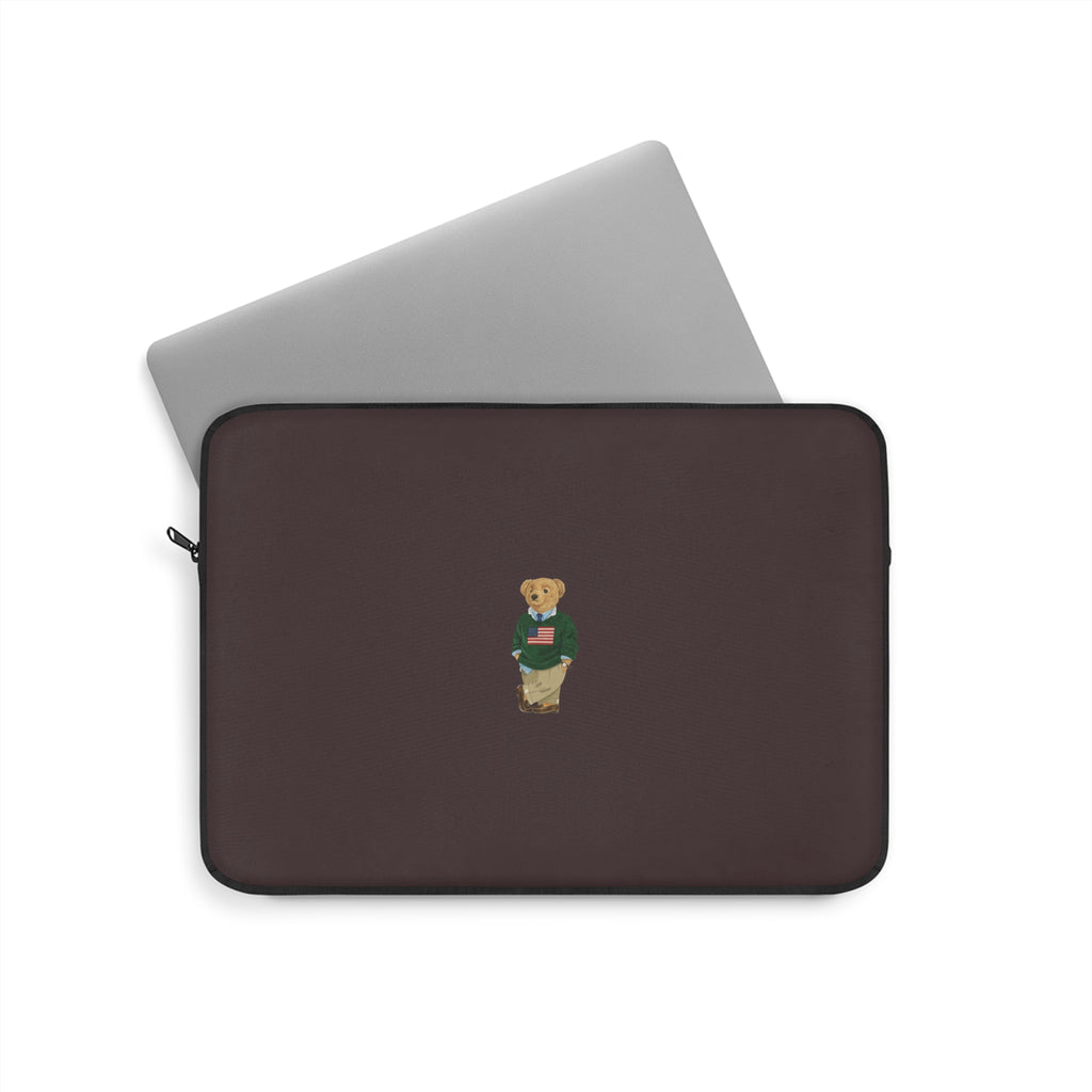 Neoprene tablet sleeve with brown finish, teddy bear patch, and zip closure.