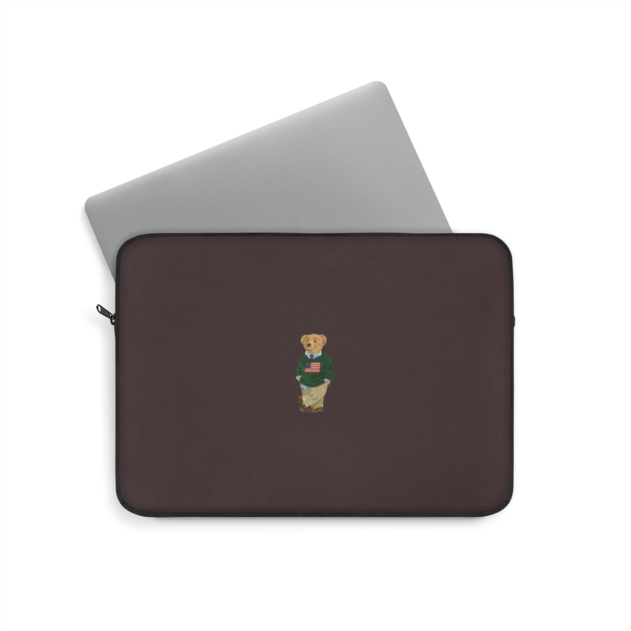 Neoprene tablet sleeve with brown finish, teddy bear patch, and zip closure.
