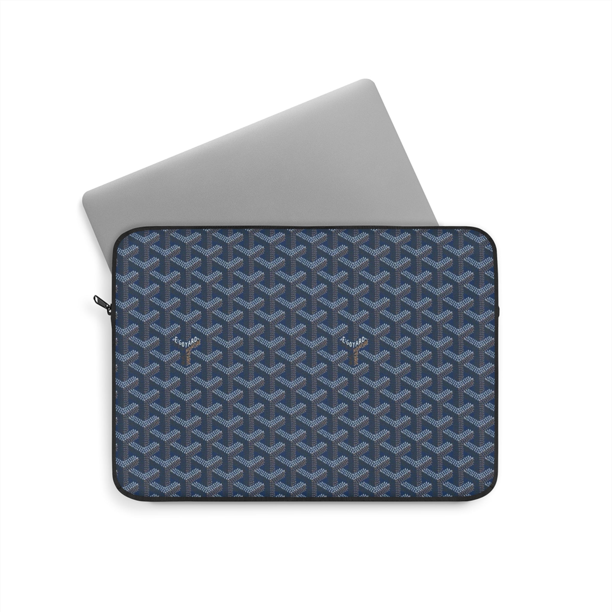 Tablet and laptop sleeve in steel blue with geometric Goyard-style pattern and zipper