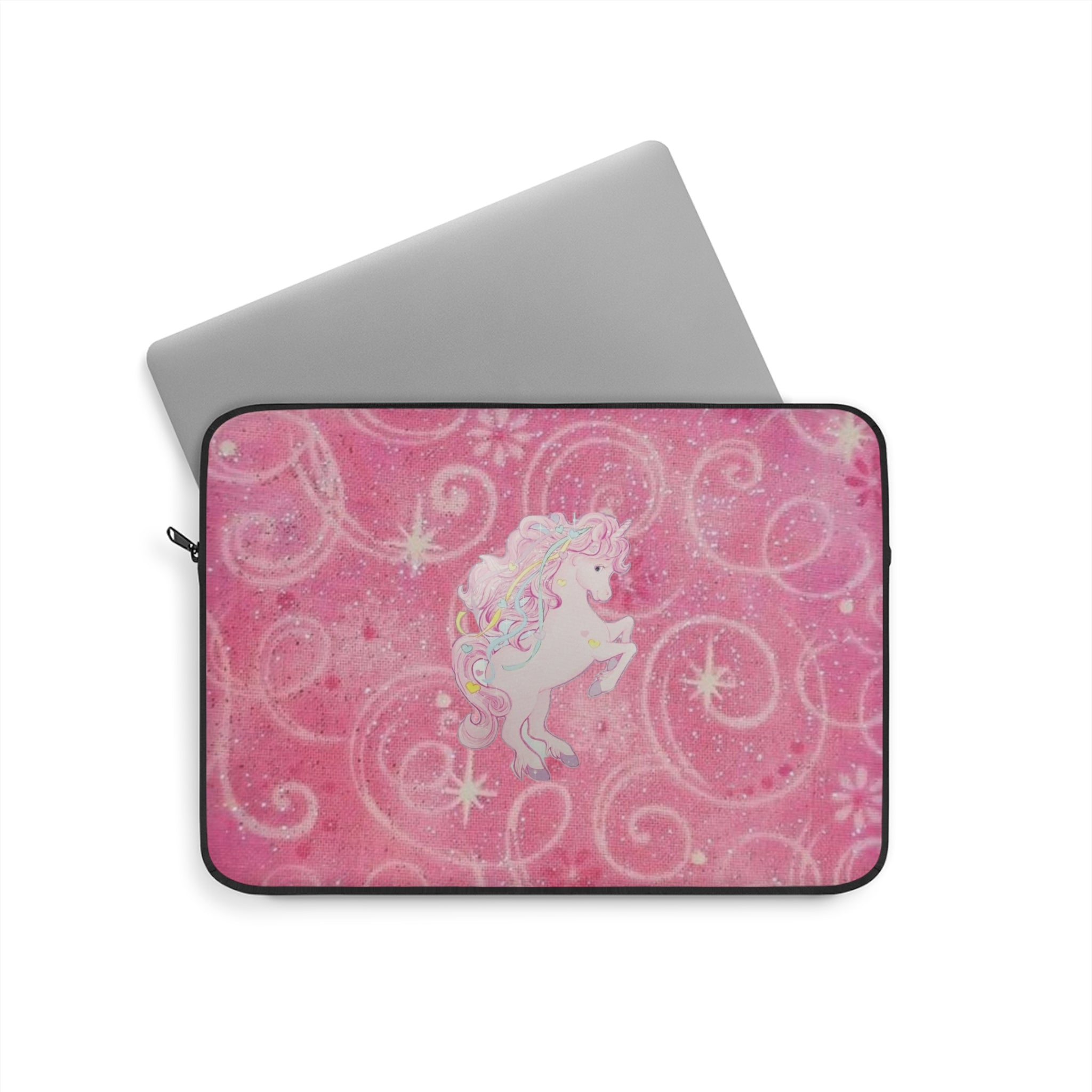 Pink glitter unicorn tablet laptop sleeve with black zipper and swirly pattern